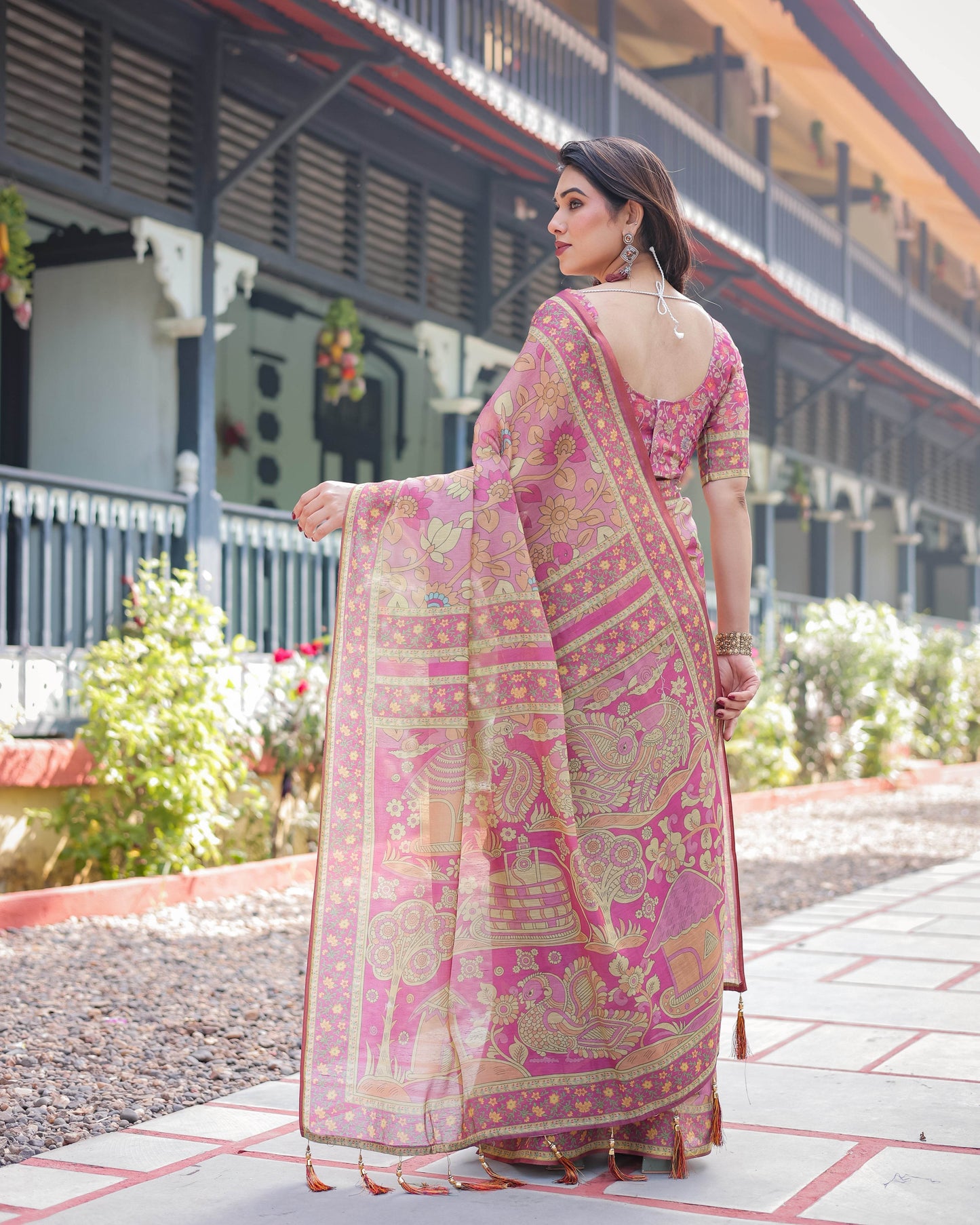 Regal Pink Handloom Cotton-Linen Saree with Floral Motifs, Golden Zari Highlights, and Tassel Detailing - SEEANS