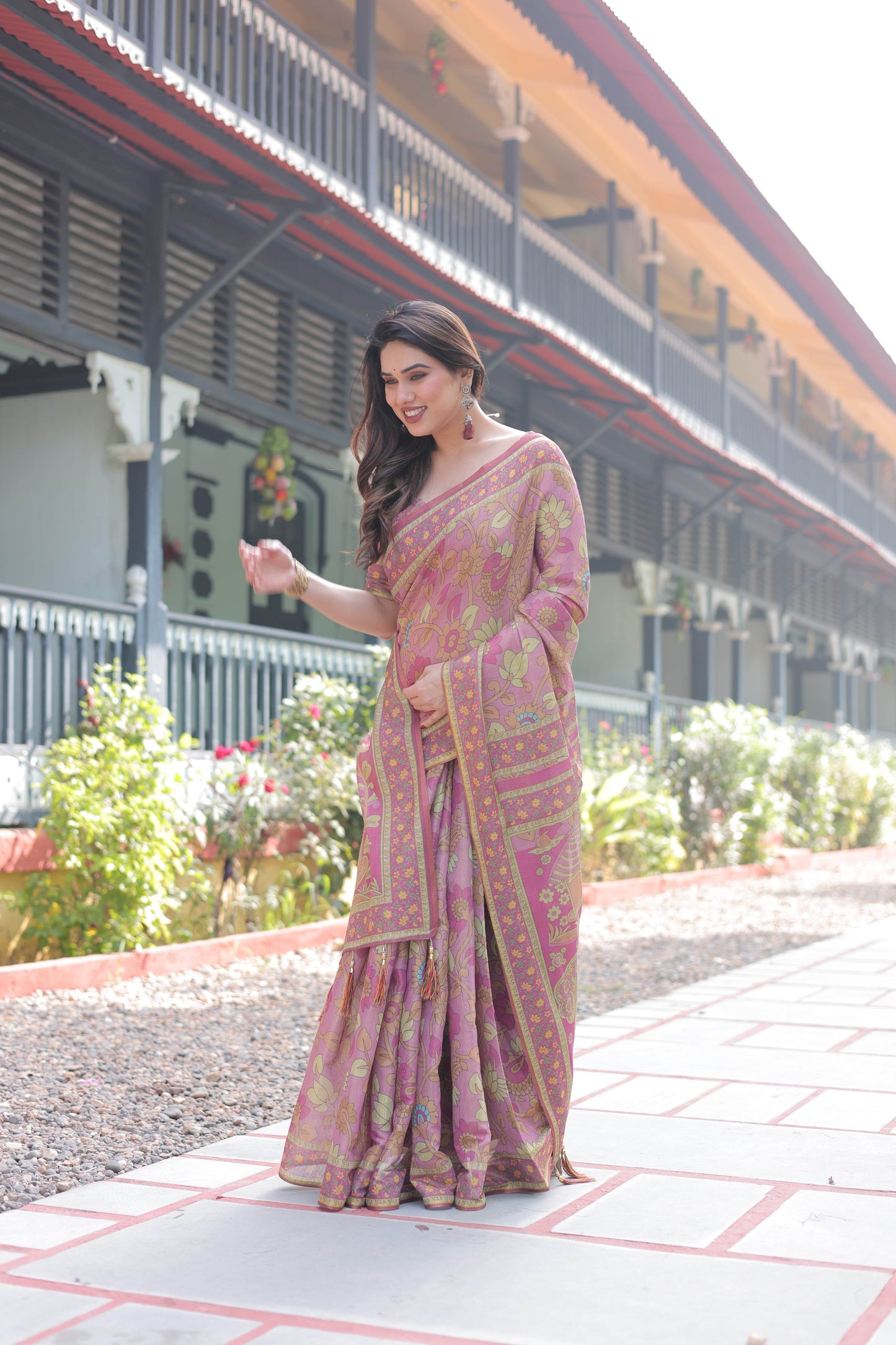 Regal Pink Handloom Cotton-Linen Saree with Floral Motifs, Golden Zari Highlights, and Tassel Detailing - SEEANS