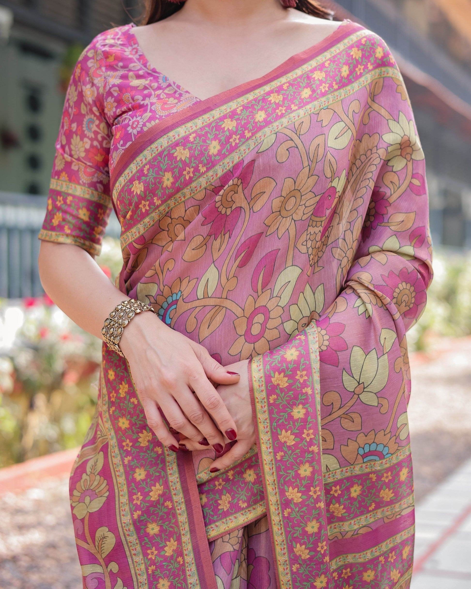 Regal Pink Handloom Cotton-Linen Saree with Floral Motifs, Golden Zari Highlights, and Tassel Detailing - SEEANS