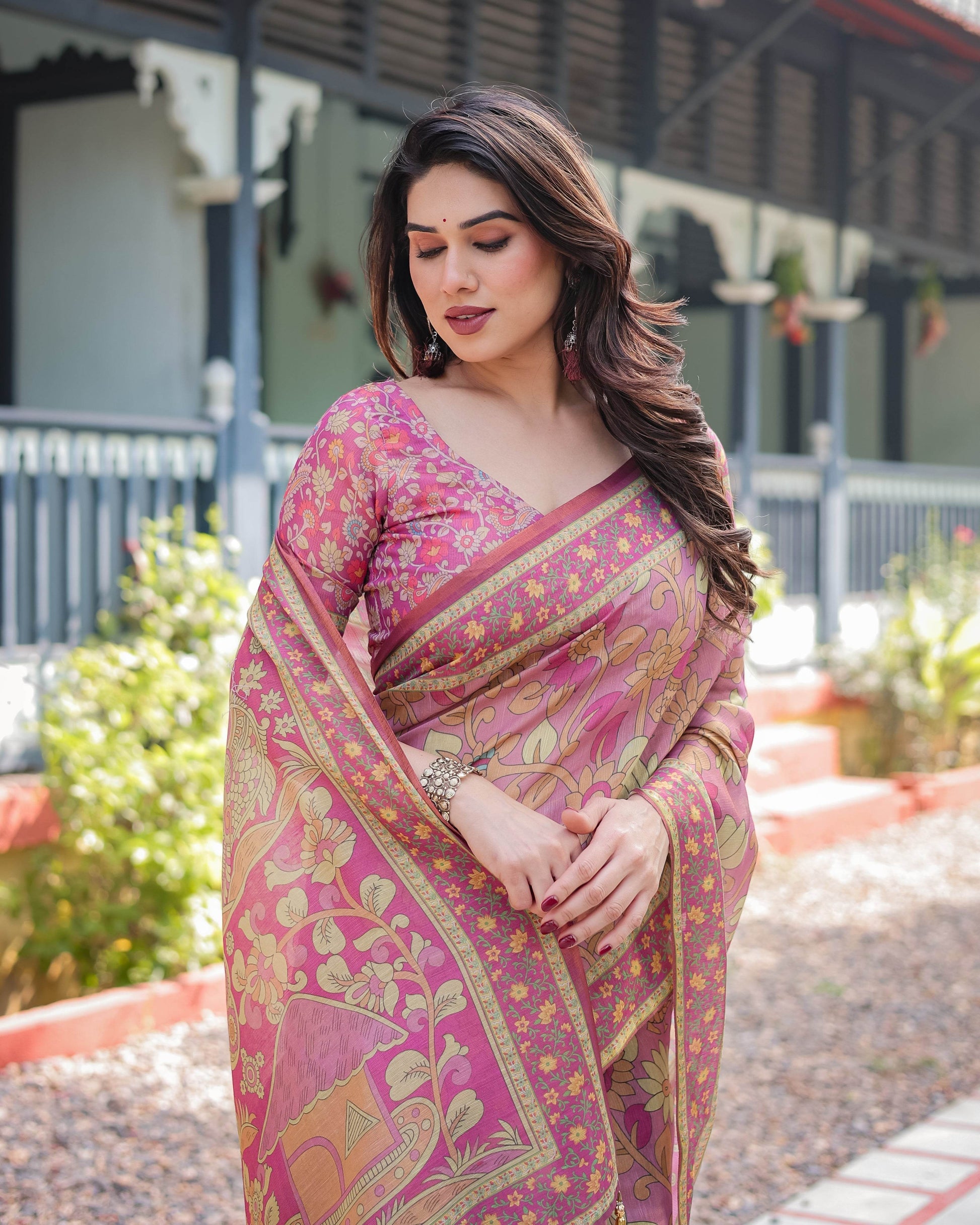 Regal Pink Handloom Cotton-Linen Saree with Floral Motifs, Golden Zari Highlights, and Tassel Detailing - SEEANS