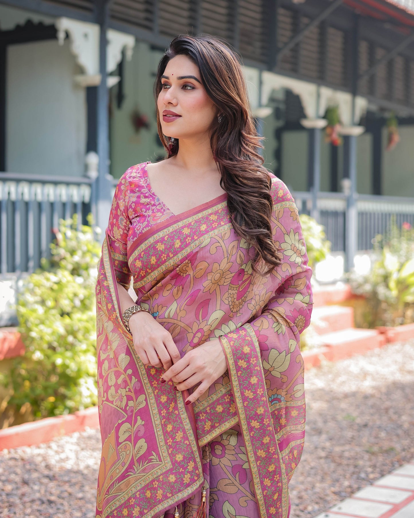 Regal Pink Handloom Cotton-Linen Saree with Floral Motifs, Golden Zari Highlights, and Tassel Detailing - SEEANS