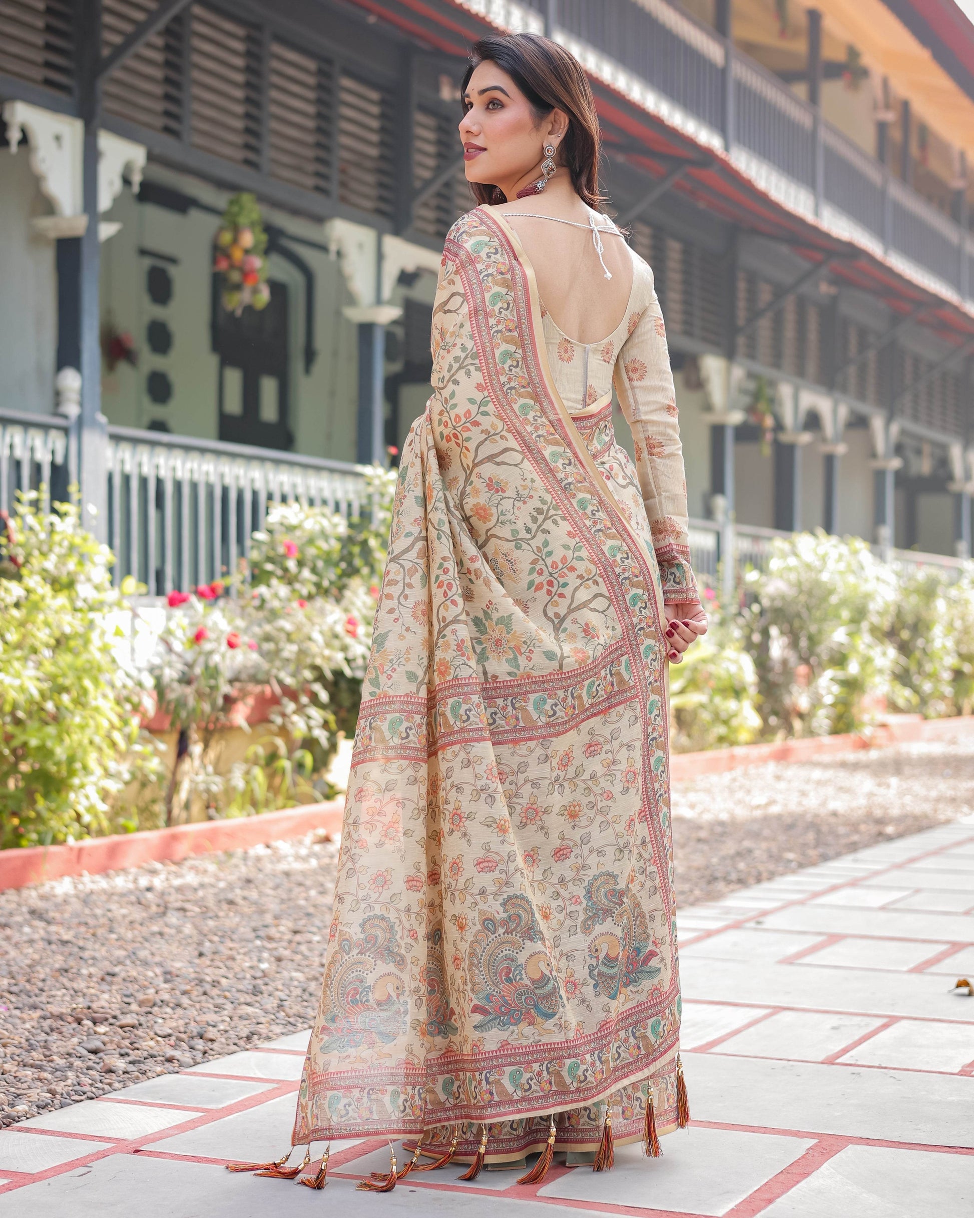 Ivory Handloom Cotton-Linen Saree with Floral and Peacock Motifs, Zari Highlights, and Tassel Finish - SEEANS