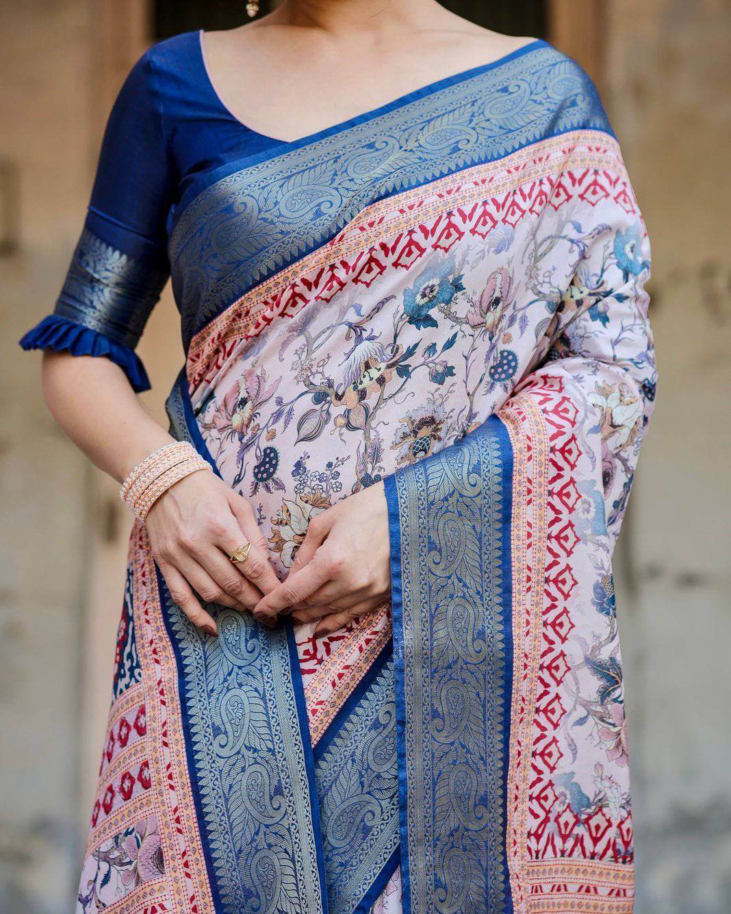 Ivory and Navy Blue Tussar Silk Saree with Floral Elegance and Ornamental Zari Work - SEEANS