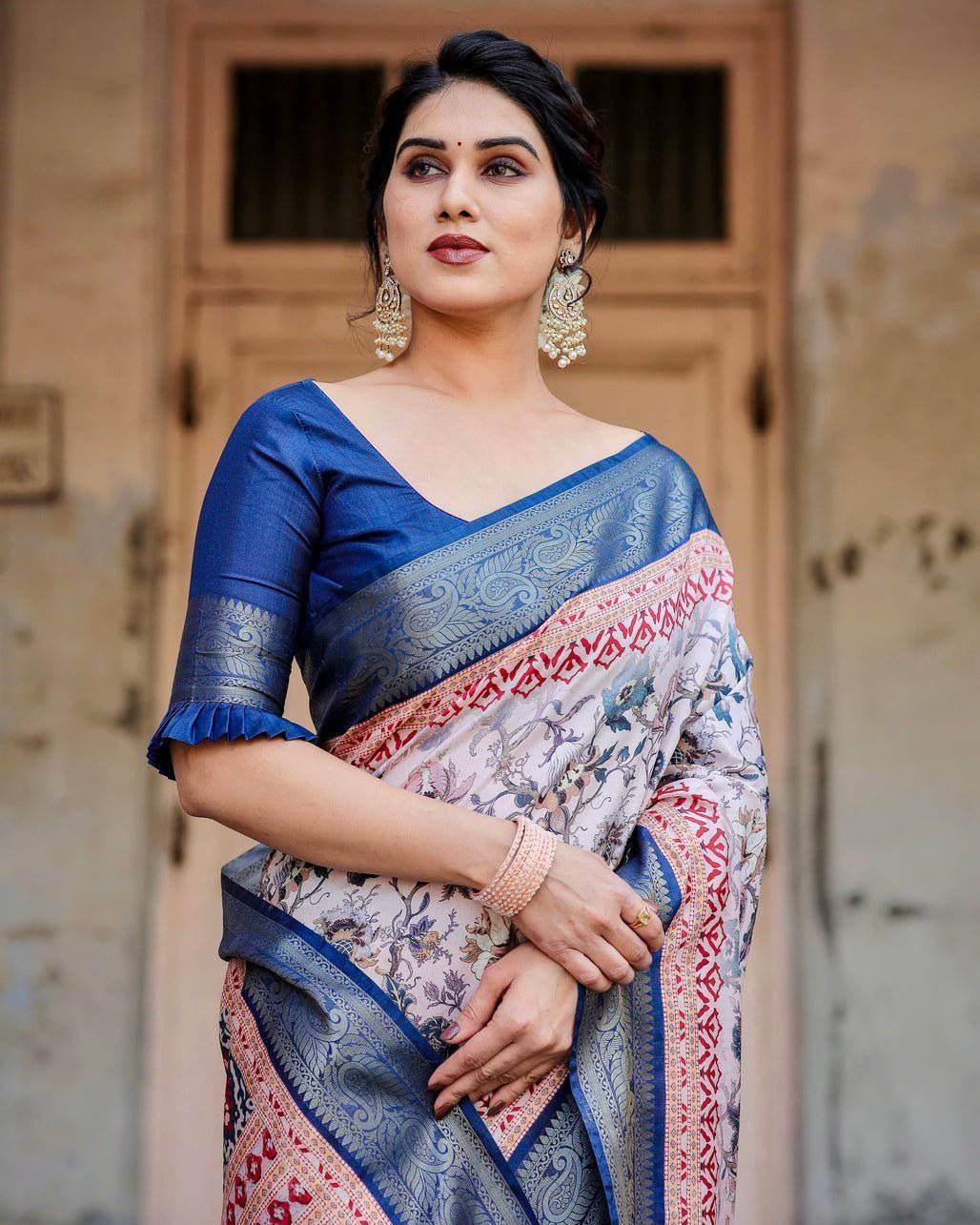 Ivory and Navy Blue Tussar Silk Saree with Floral Elegance and Ornamental Zari Work - SEEANS