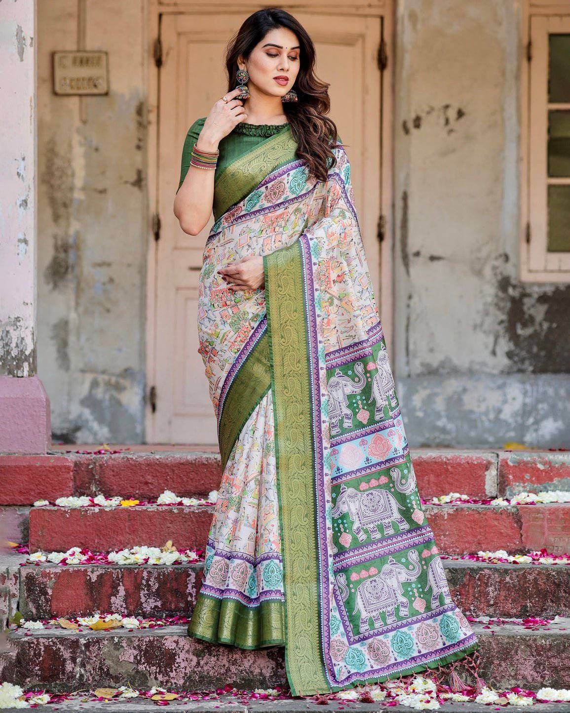 Ivory and Green Tussar Silk Saree with Elephant Motifs and Intricate Zari Border - SEEANS