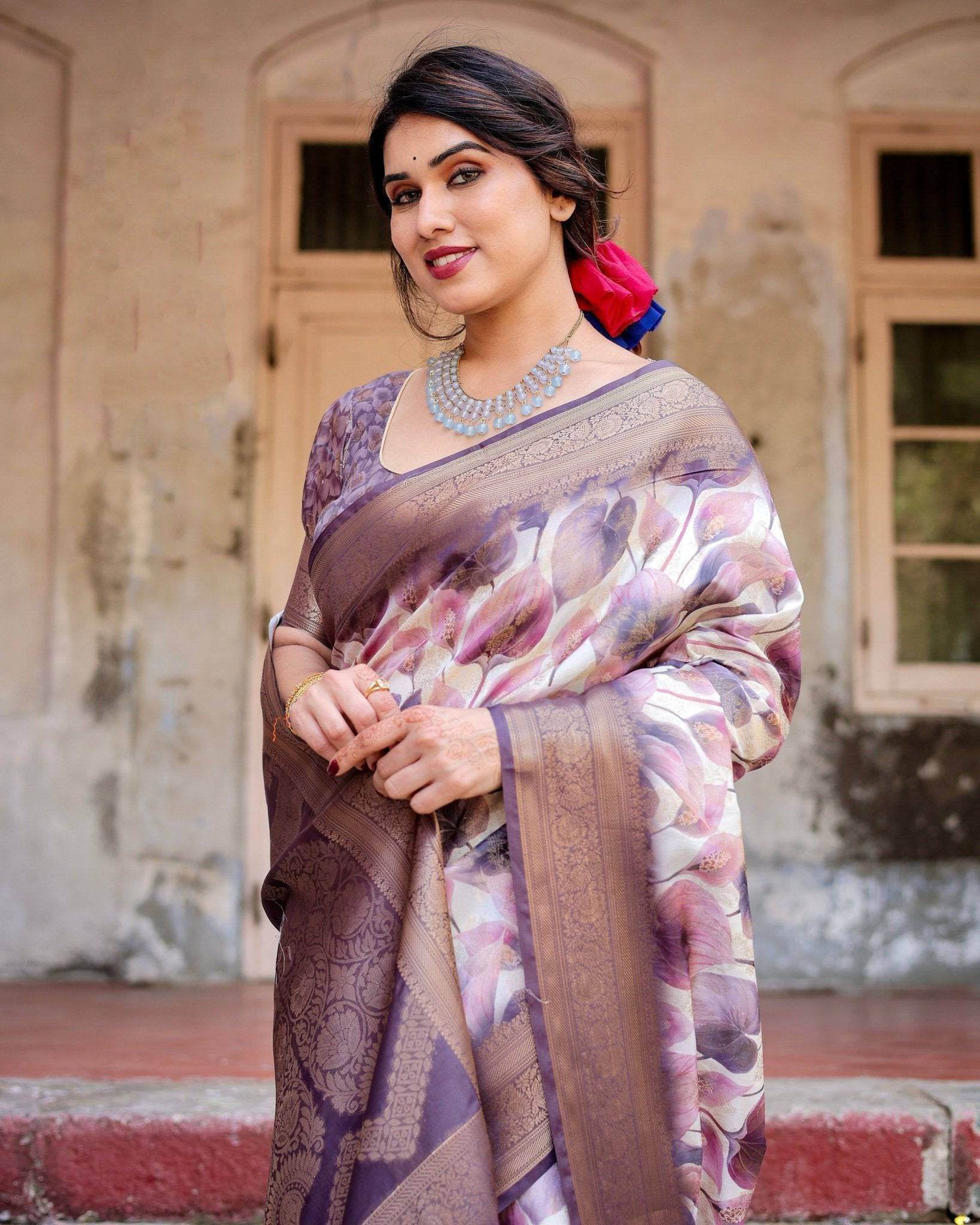 Elegant Purple Floral Banarasi Silk Saree with Intricate Zari Weave and Tassels - SEEANS