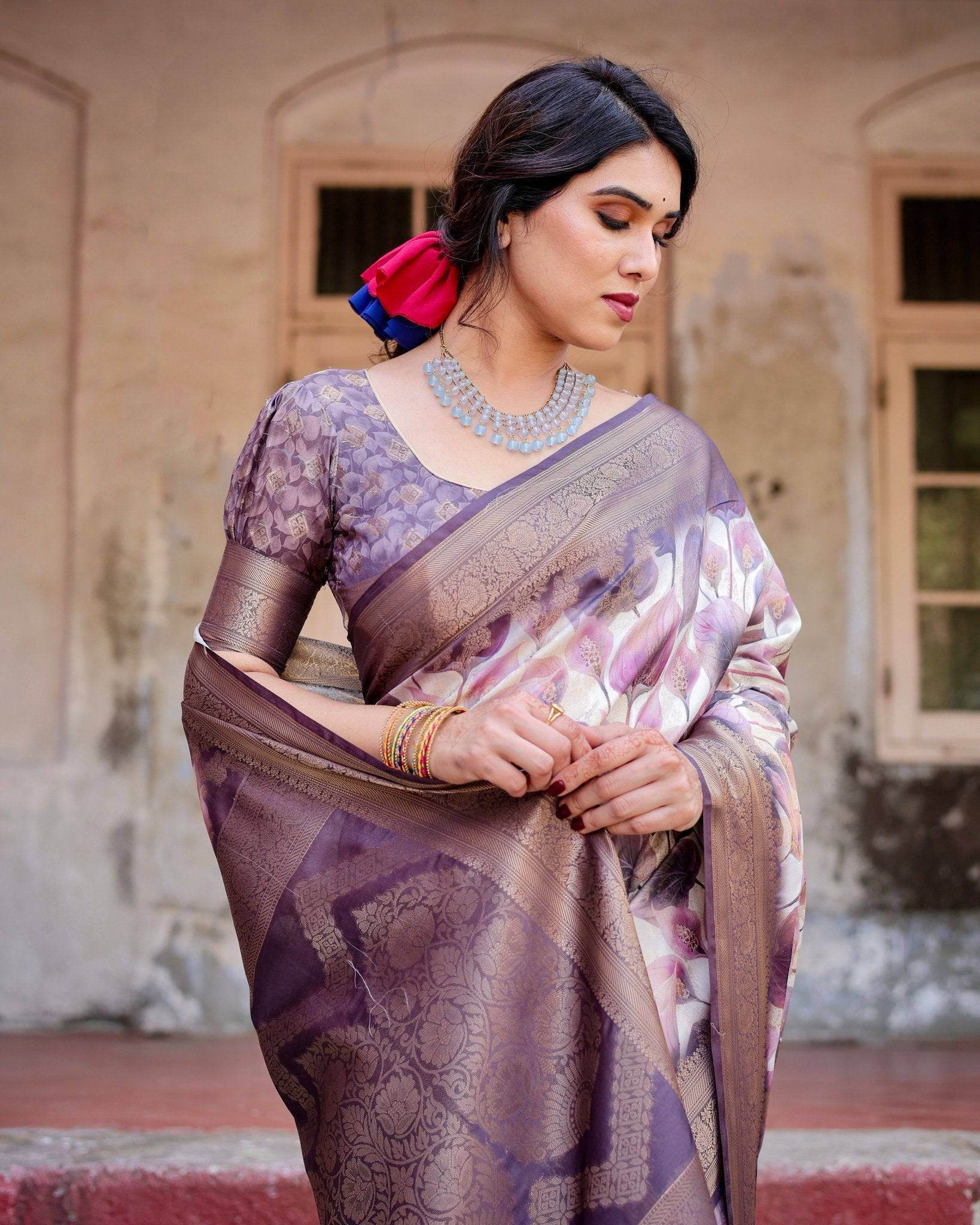 Elegant Purple Floral Banarasi Silk Saree with Intricate Zari Weave and Tassels - SEEANS