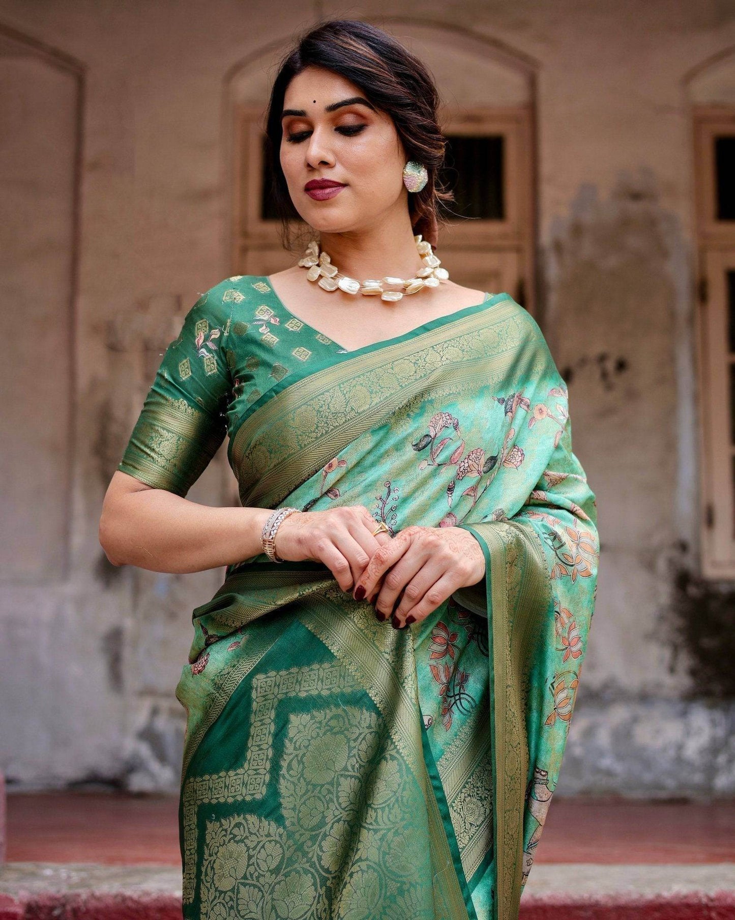 Graceful Green Banarasi Silk Saree with Intricate Floral and Elephant Weaves - SEEANS