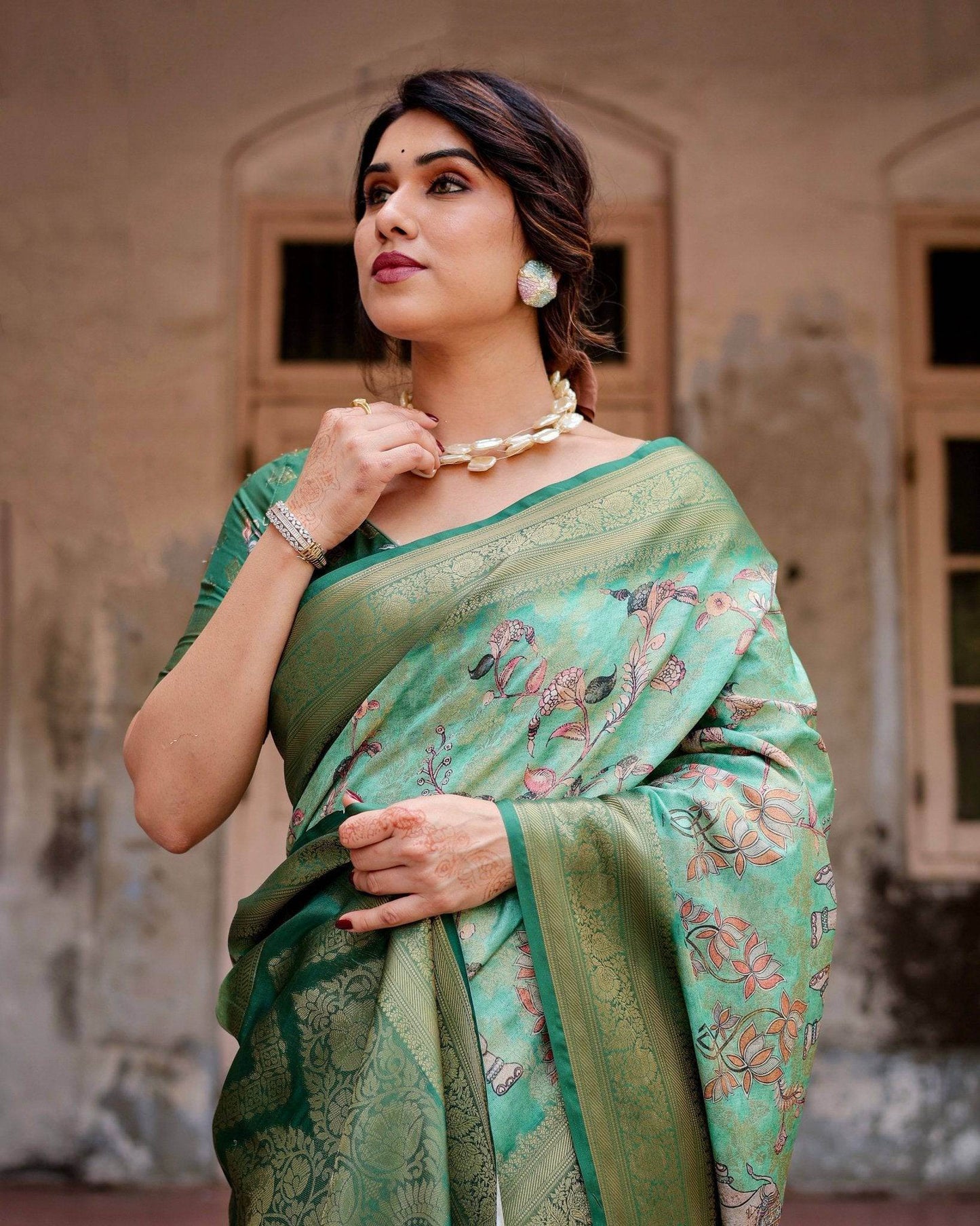 Graceful Green Banarasi Silk Saree with Intricate Floral and Elephant Weaves - SEEANS