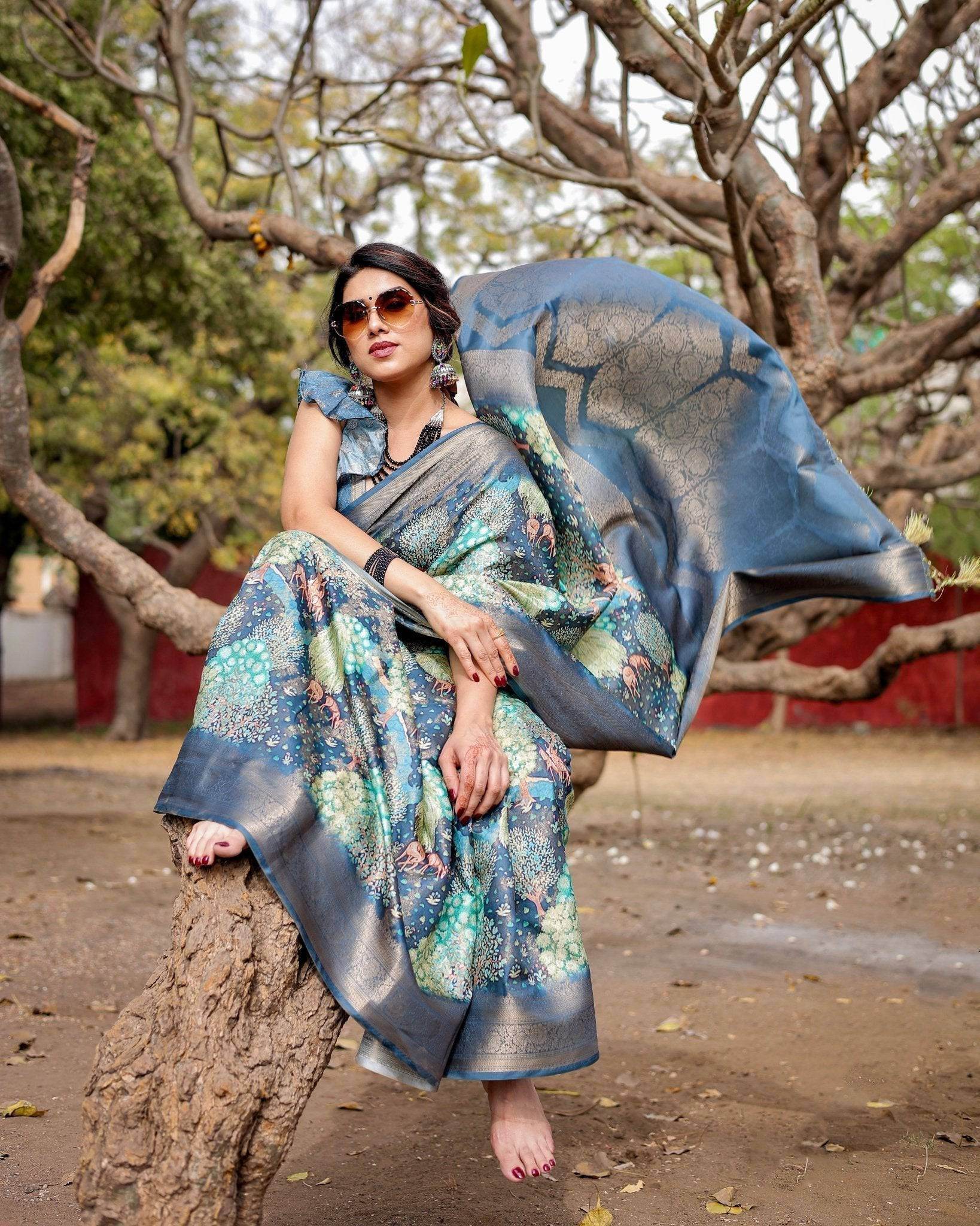 Graceful Navy Blue Banarasi Silk Saree with Nature-Inspired Digital Prints and Elegant Zari Woven Border - SEEANS