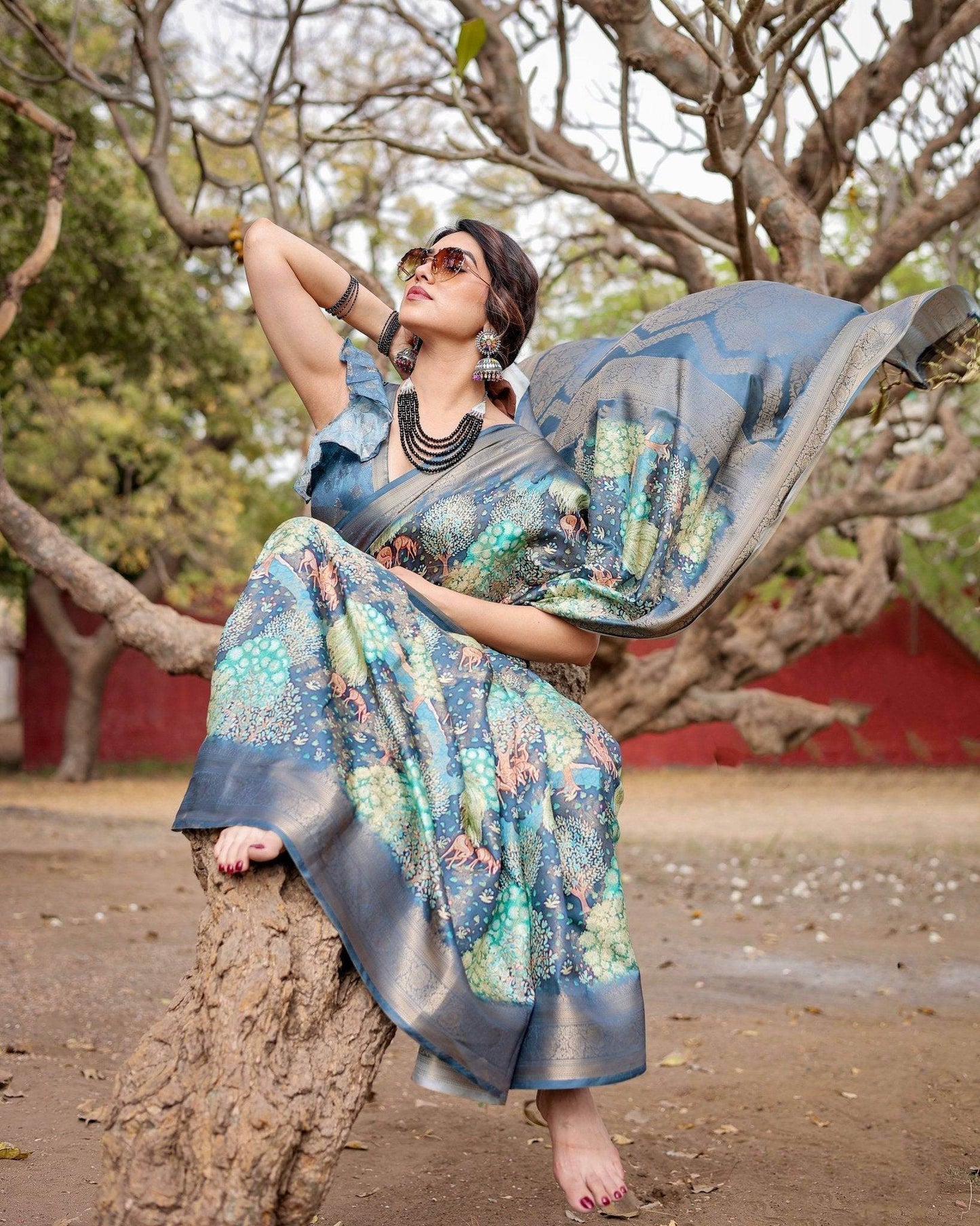 Graceful Navy Blue Banarasi Silk Saree with Nature-Inspired Digital Prints and Elegant Zari Woven Border - SEEANS