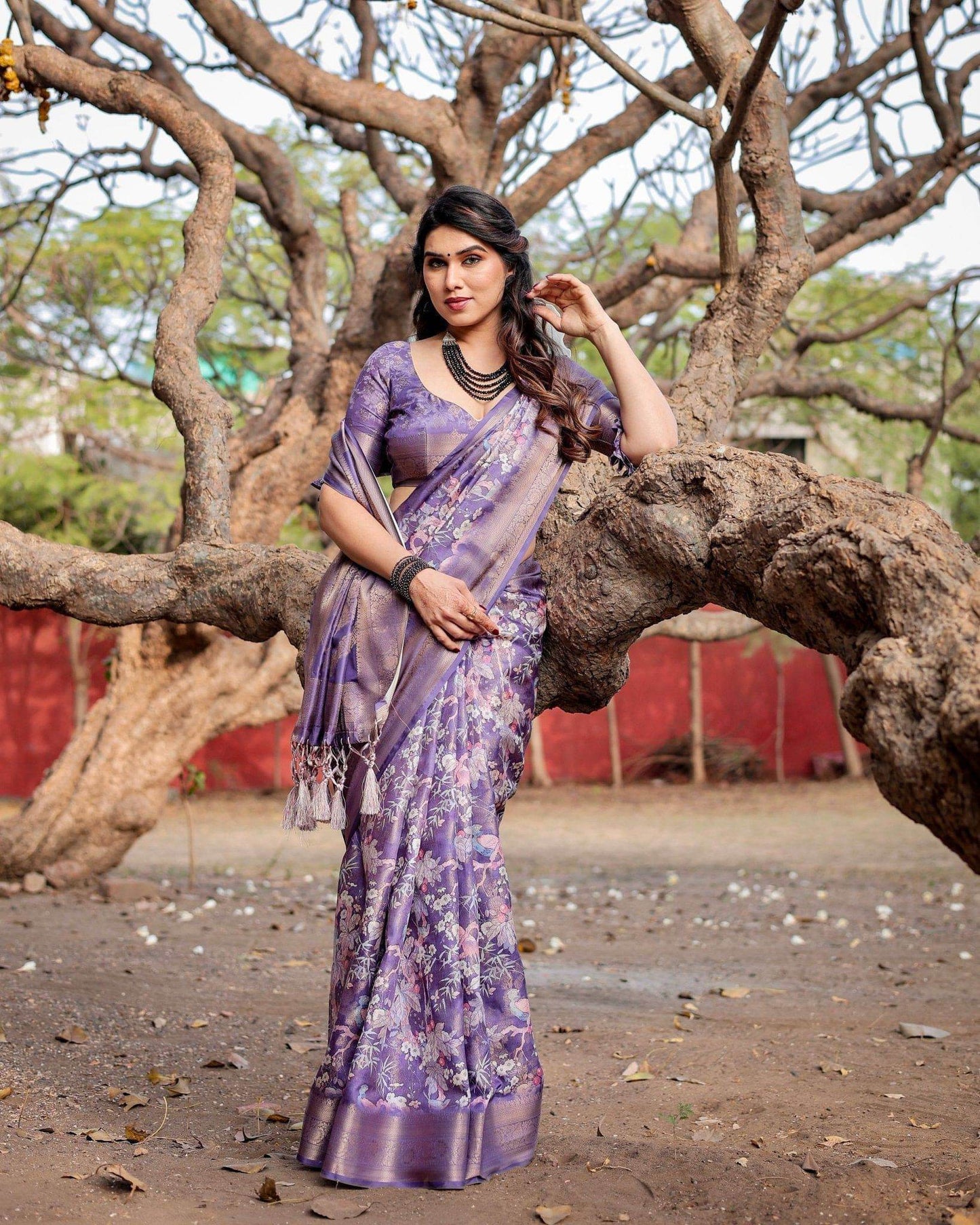 Elegant Purple Banarasi Silk Saree with Floral Weave, Zari Border, and Tassels - SEEANS