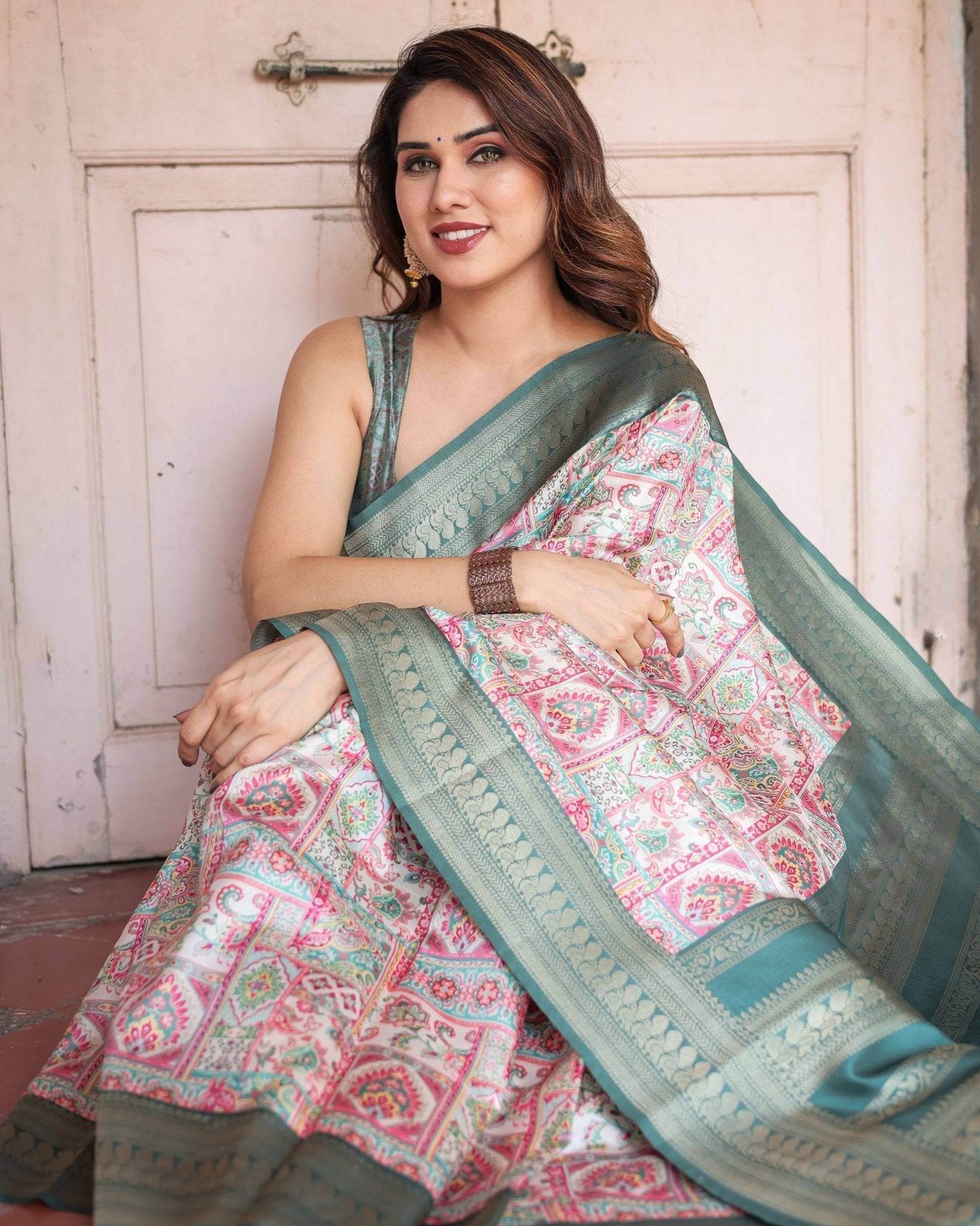 White Banarasi Silk Saree with Pastel Multicolor Prints and Green Zari Border - SEEANS