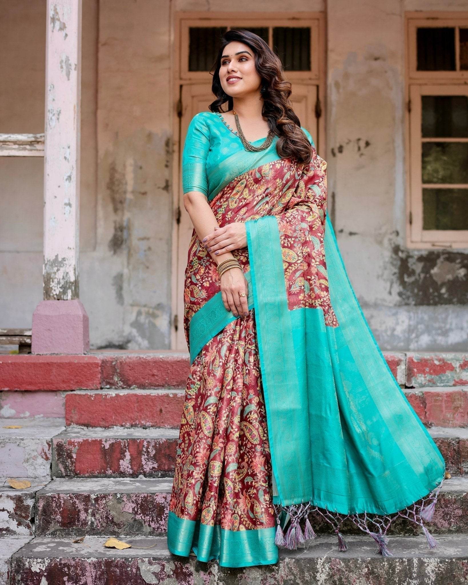 Maroon and Teal Paisley Design Banarasi Silk Saree with Zari Weave and Tassel-Embellished Pallu - SEEANS