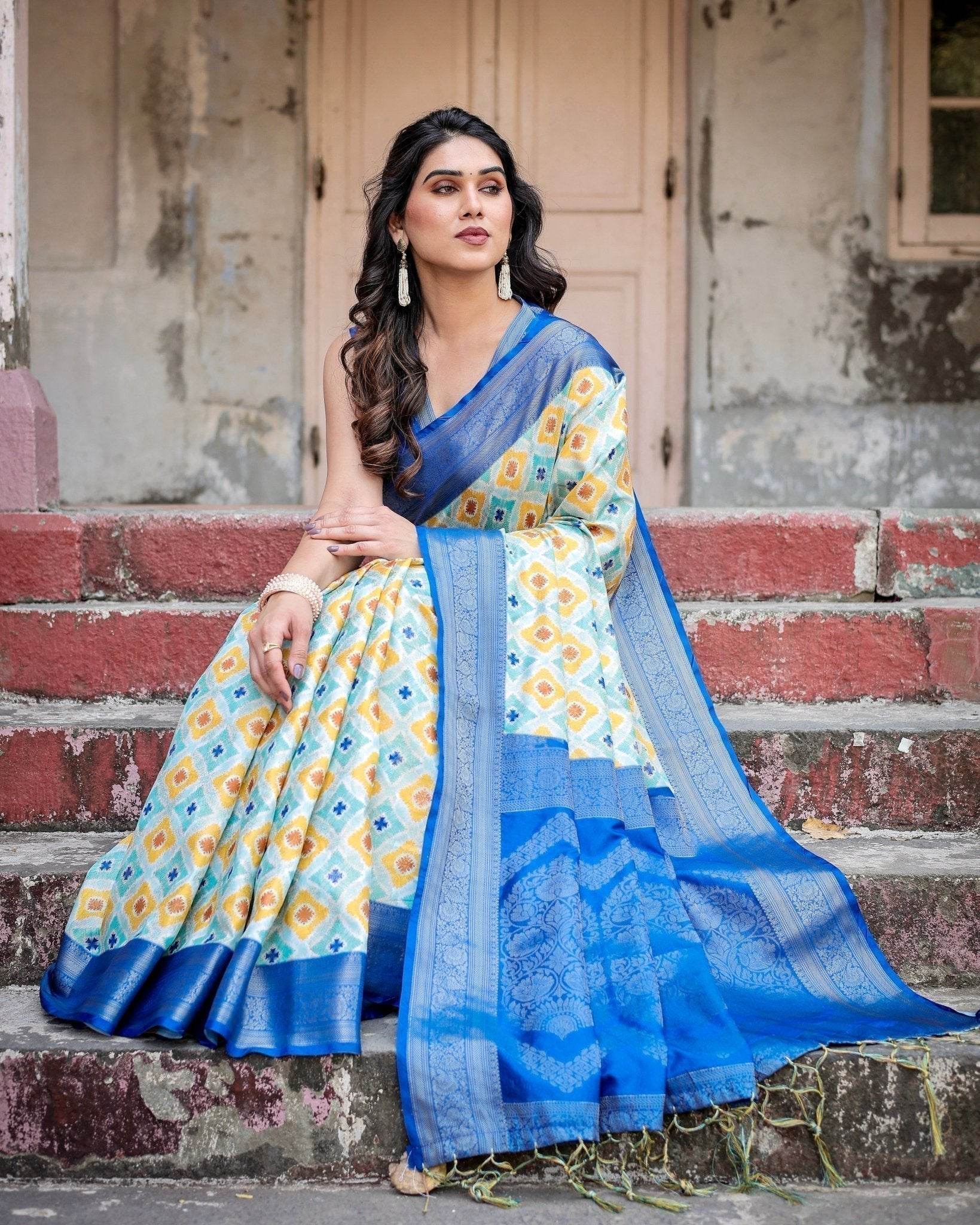 Yellow and Blue Ikat Digital Print Banarasi Silk Saree with Zari Weave and Tassel-Embellished Pallu - SEEANS