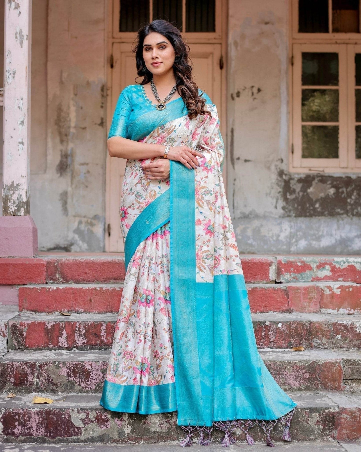 White and Aqua Floral Design Banarasi Silk Saree with Zari Weave and Tassel-Embellished Pallu - SEEANS