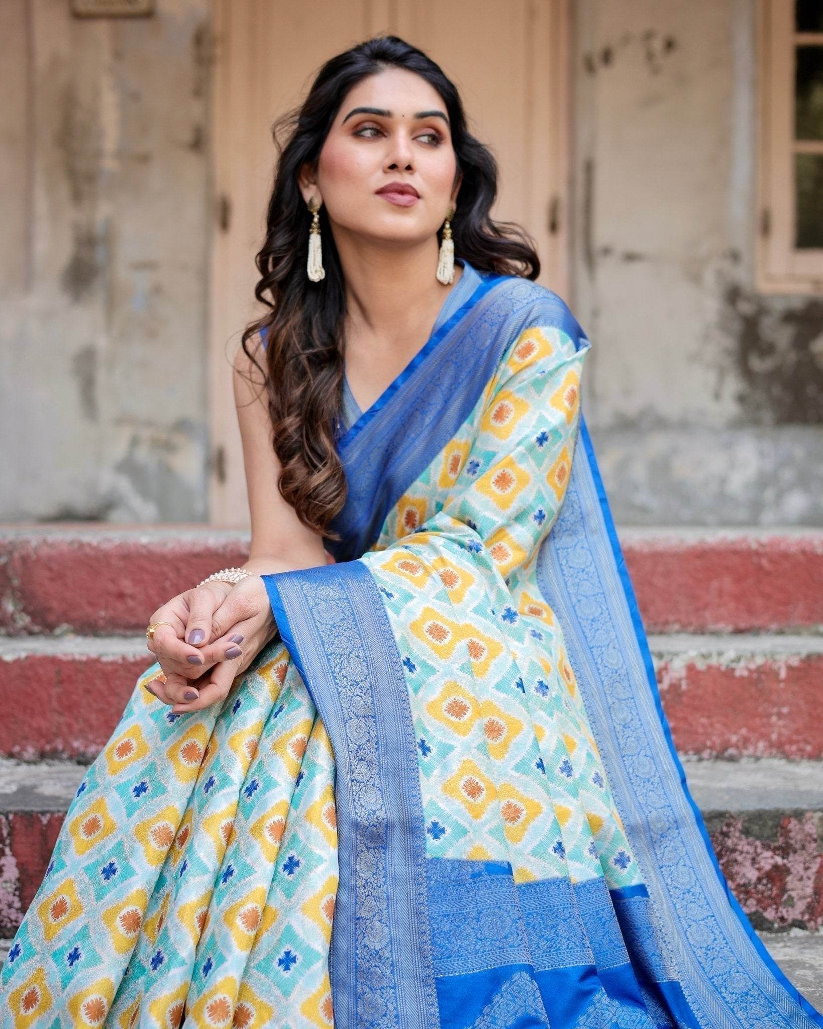 Yellow and Blue Ikat Digital Print Banarasi Silk Saree with Zari Weave and Tassel-Embellished Pallu - SEEANS