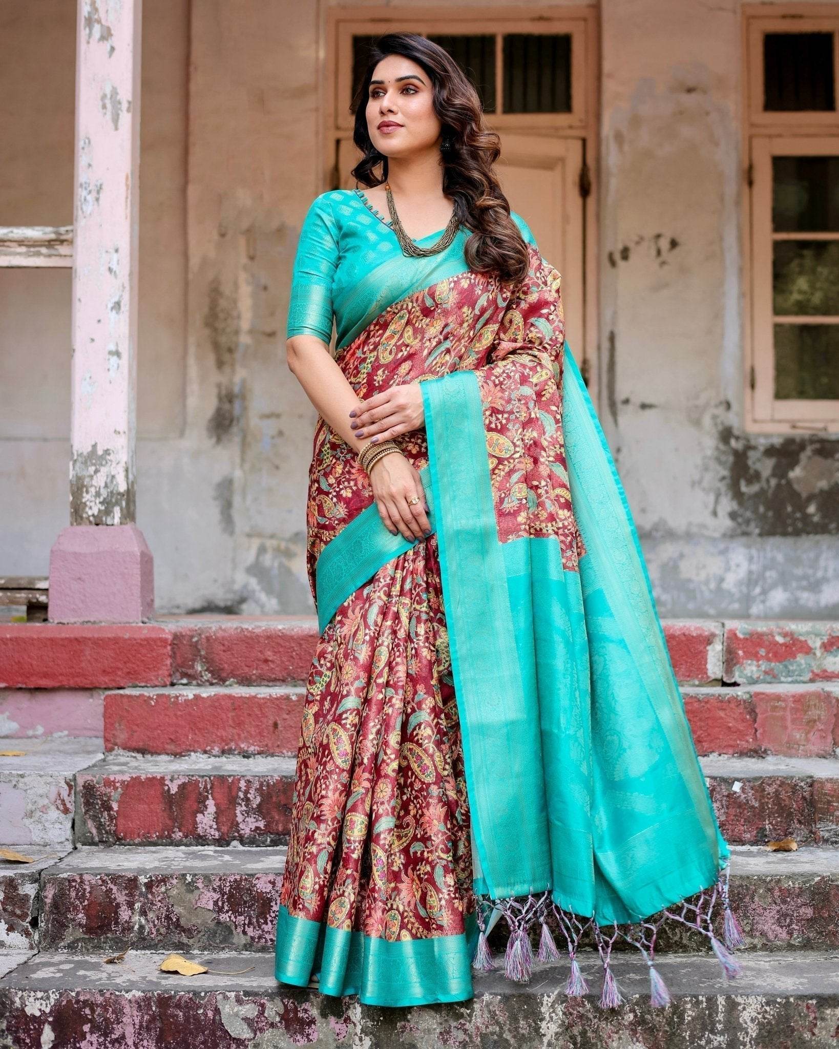 Maroon and Teal Paisley Design Banarasi Silk Saree with Zari Weave and Tassel-Embellished Pallu - SEEANS