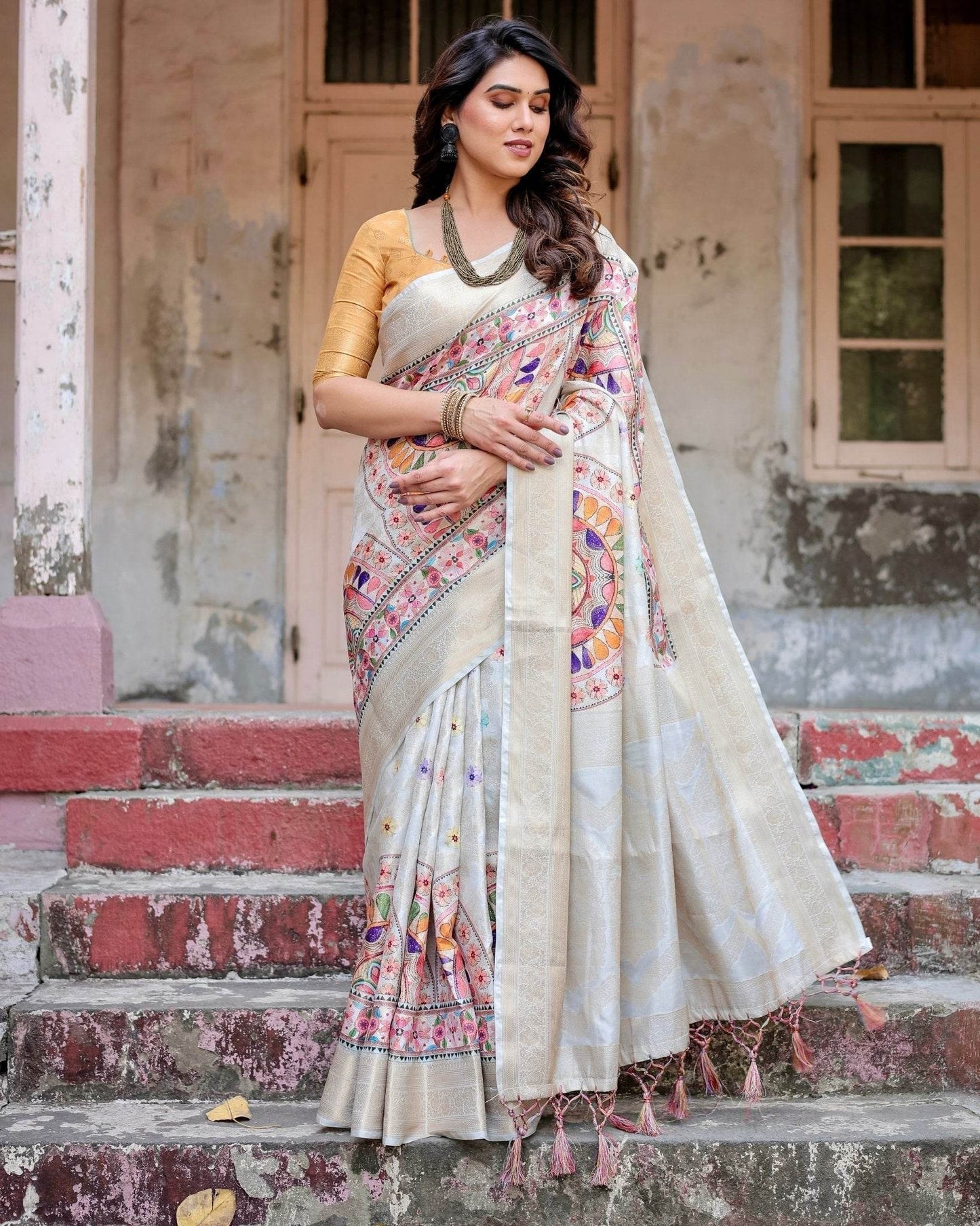 Off-White and Multicolor Mandala Design Banarasi Silk Saree with Zari Weave and Tassel-Adorned Pallu - SEEANS