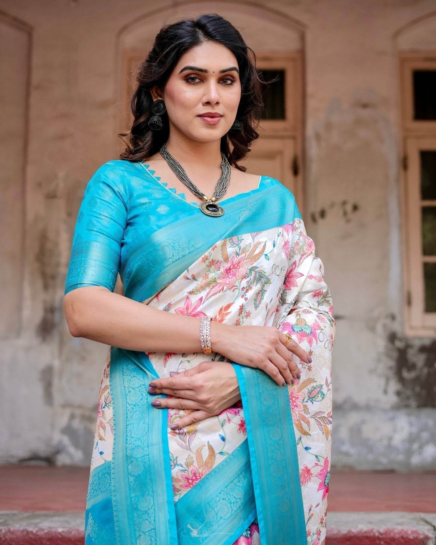 White and Aqua Floral Design Banarasi Silk Saree with Zari Weave and Tassel-Embellished Pallu - SEEANS