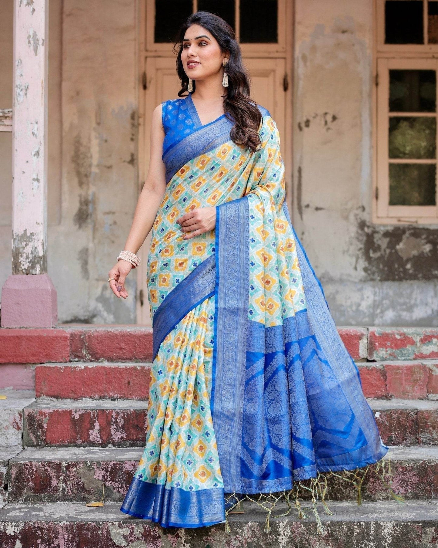 Yellow and Blue Ikat Digital Print Banarasi Silk Saree with Zari Weave and Tassel-Embellished Pallu - SEEANS