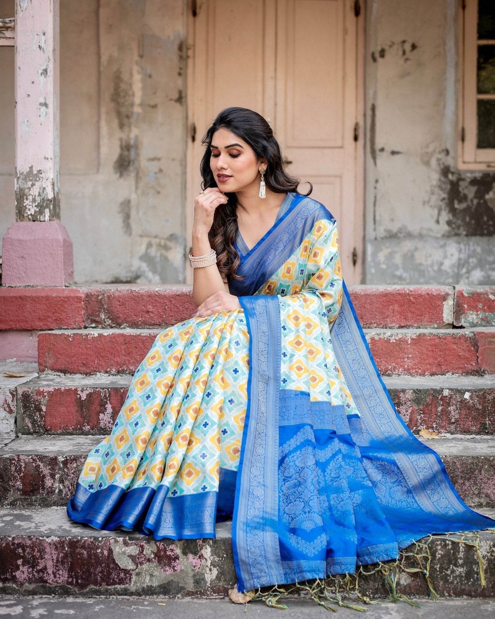 Yellow and Blue Ikat Digital Print Banarasi Silk Saree with Zari Weave and Tassel-Embellished Pallu - SEEANS