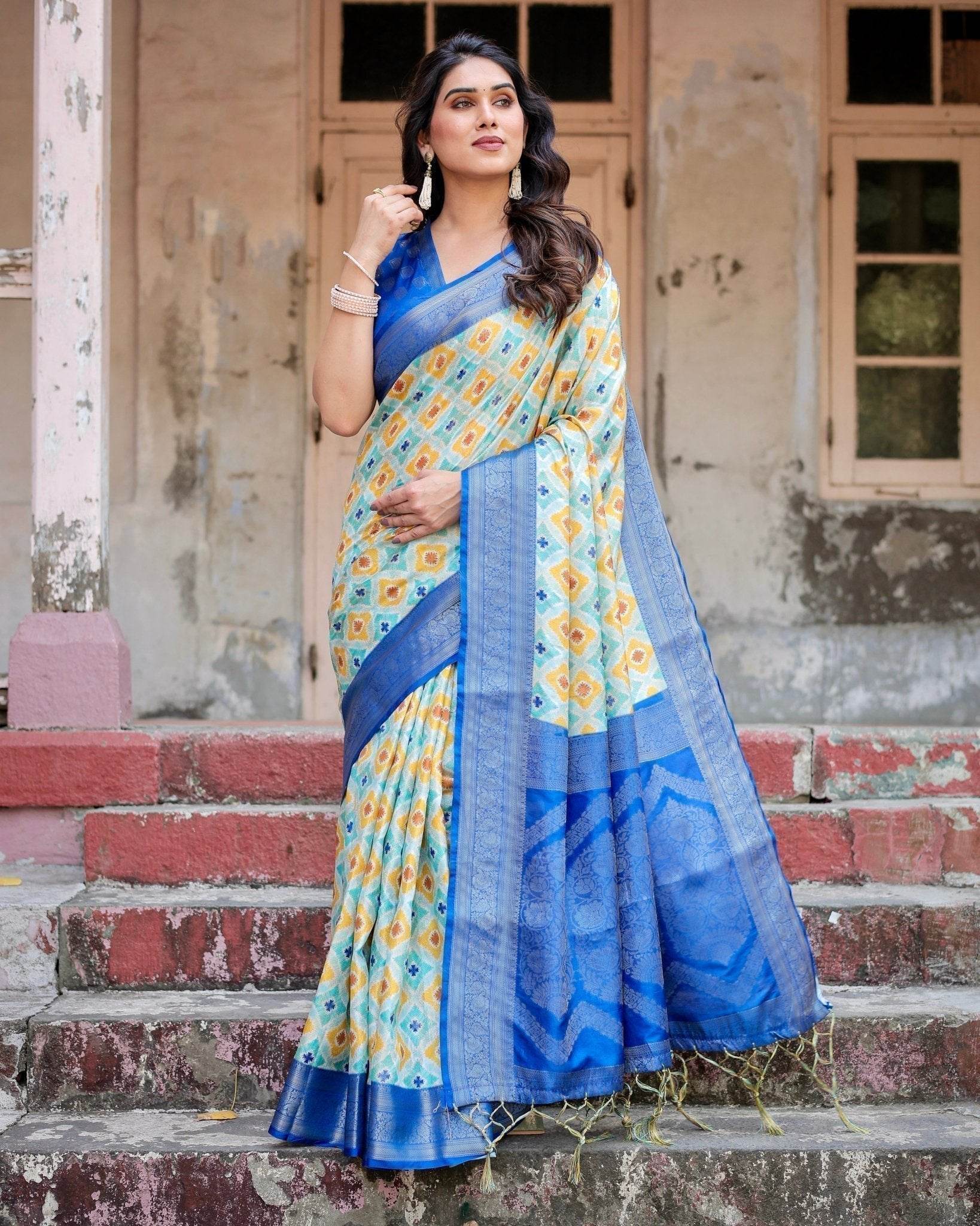 Yellow and Blue Ikat Digital Print Banarasi Silk Saree with Zari Weave and Tassel-Embellished Pallu - SEEANS