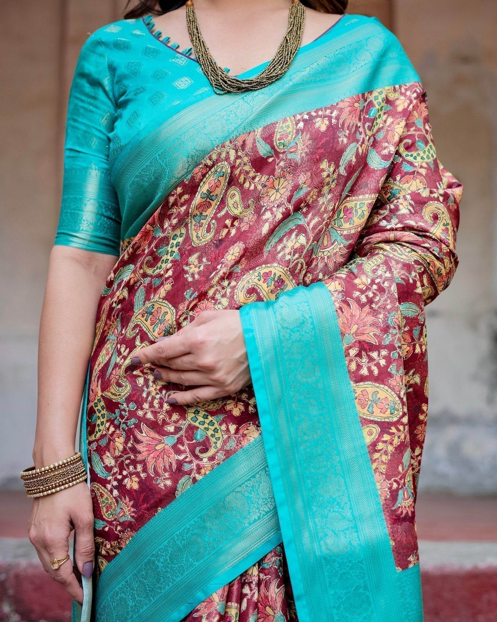 Maroon and Teal Paisley Design Banarasi Silk Saree with Zari Weave and Tassel-Embellished Pallu - SEEANS