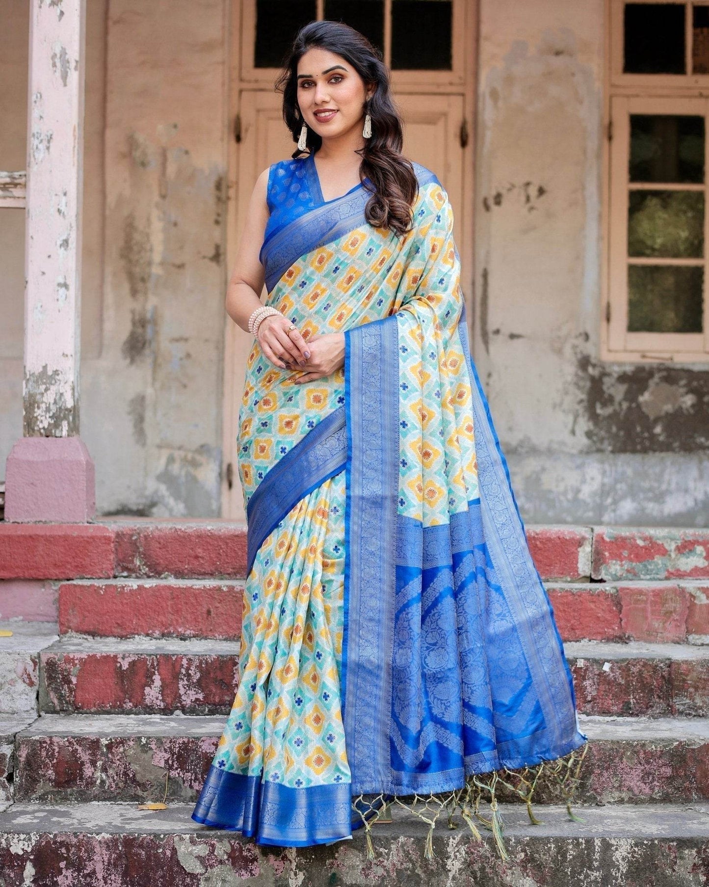 Yellow and Blue Ikat Digital Print Banarasi Silk Saree with Zari Weave and Tassel-Embellished Pallu - SEEANS