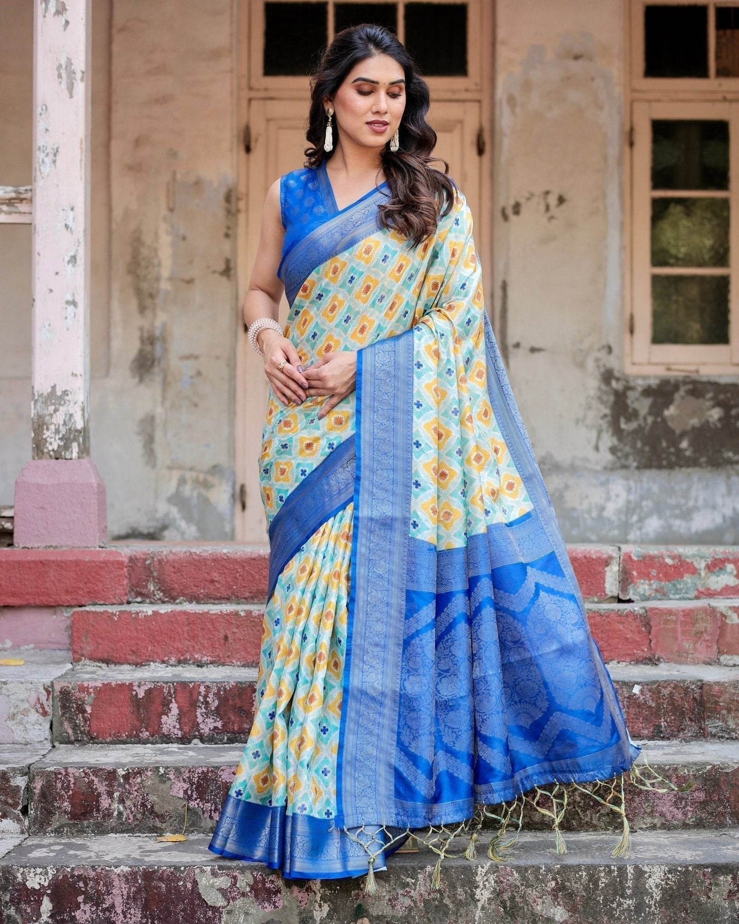 Yellow and Blue Ikat Digital Print Banarasi Silk Saree with Zari Weave and Tassel-Embellished Pallu - SEEANS