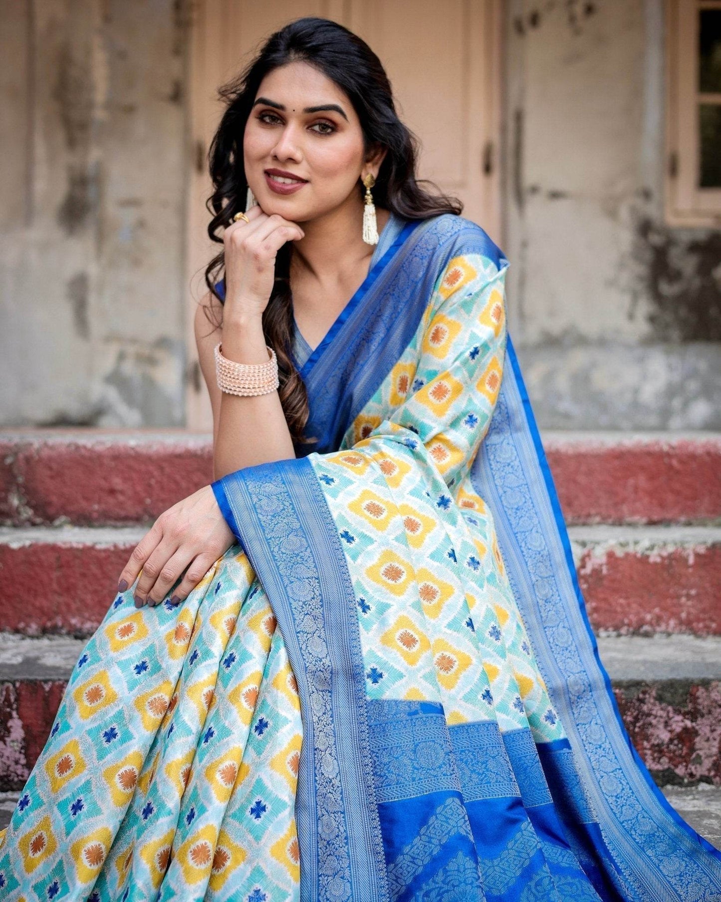 Yellow and Blue Ikat Digital Print Banarasi Silk Saree with Zari Weave and Tassel-Embellished Pallu - SEEANS