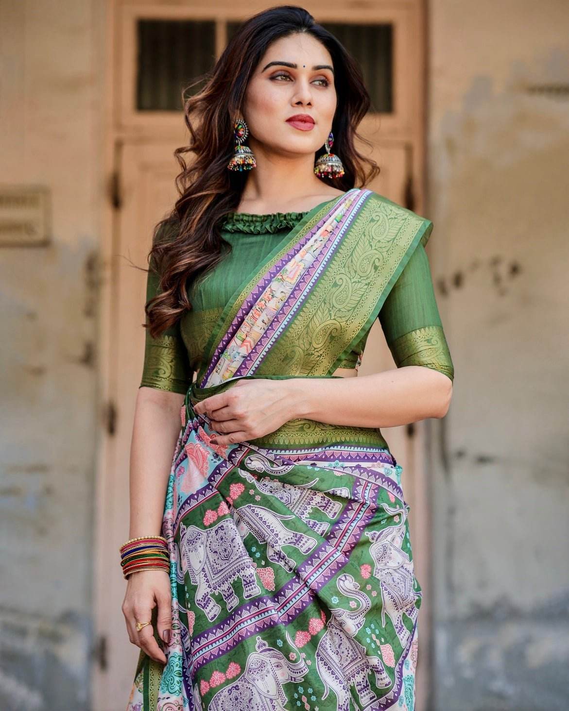 Ivory and Green Tussar Silk Saree with Elephant Motifs and Intricate Zari Border - SEEANS