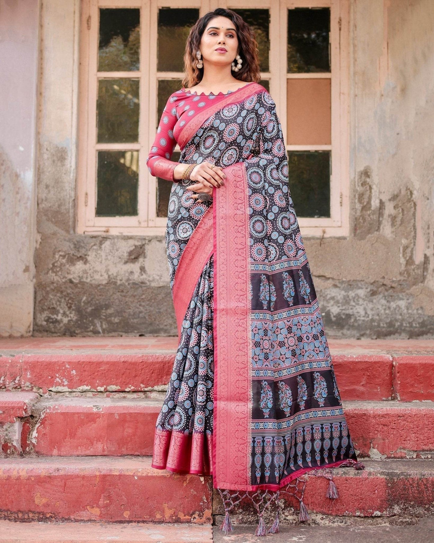 Black and Coral Tussar Silk Saree with Intricate Circular Motifs and Ornamental Pallu - SEEANS