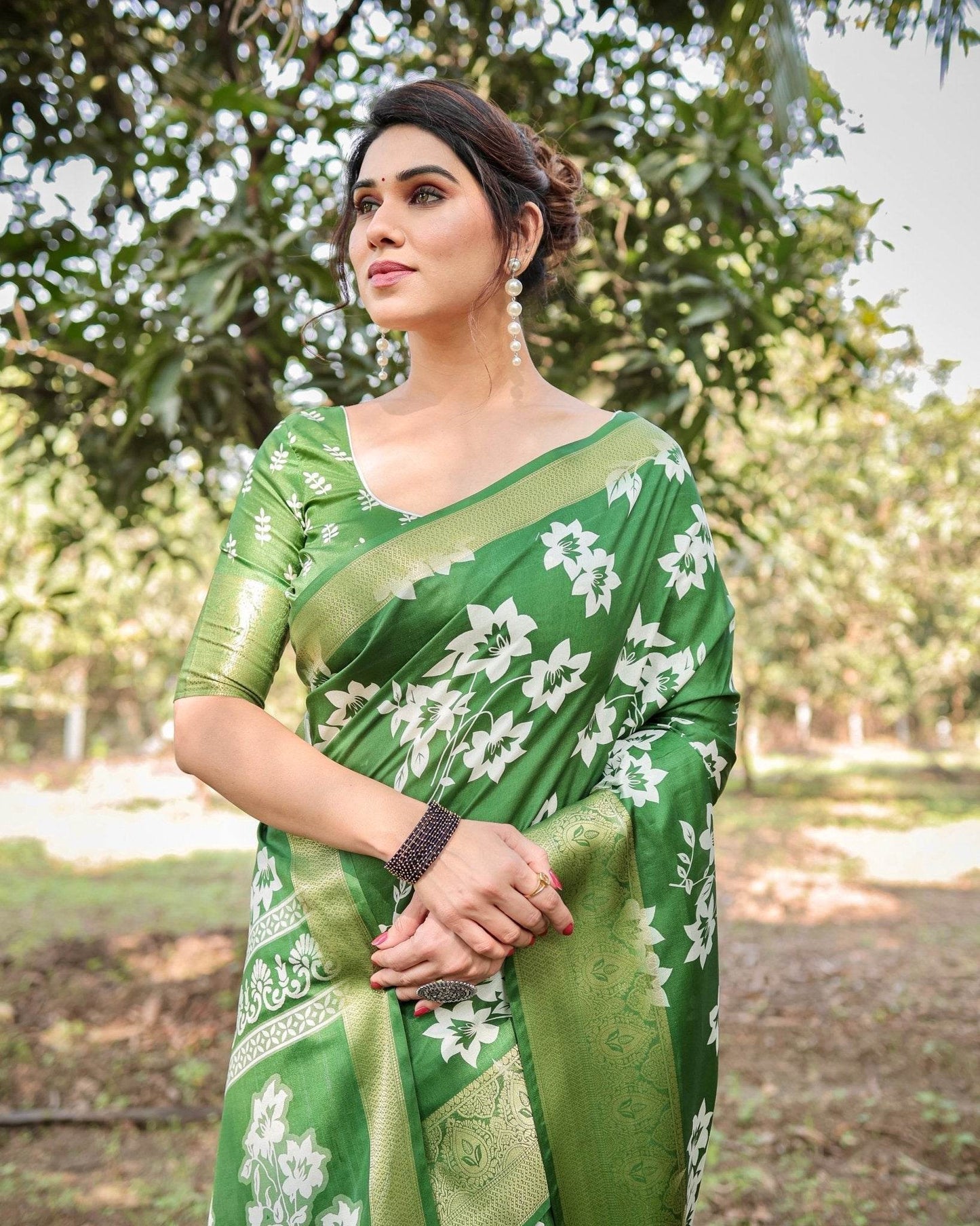 Enchanting Green Tussar Silk Saree with White Floral Prints and Zari Border - SEEANS