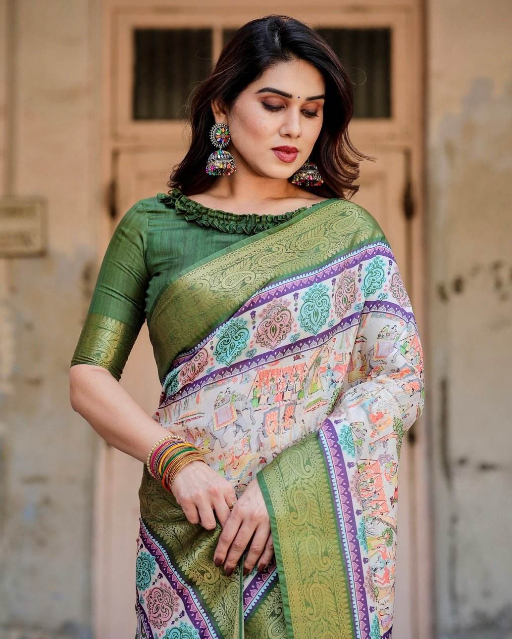 Ivory and Green Tussar Silk Saree with Elephant Motifs and Intricate Zari Border - SEEANS