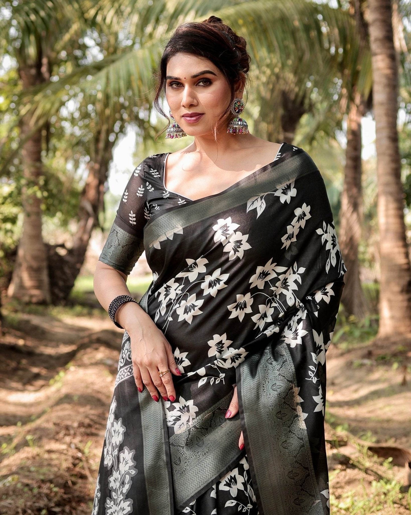 Elegant Black Tussar Silk Saree with Zari Embellished Border and Bold Floral Pallu - SEEANS