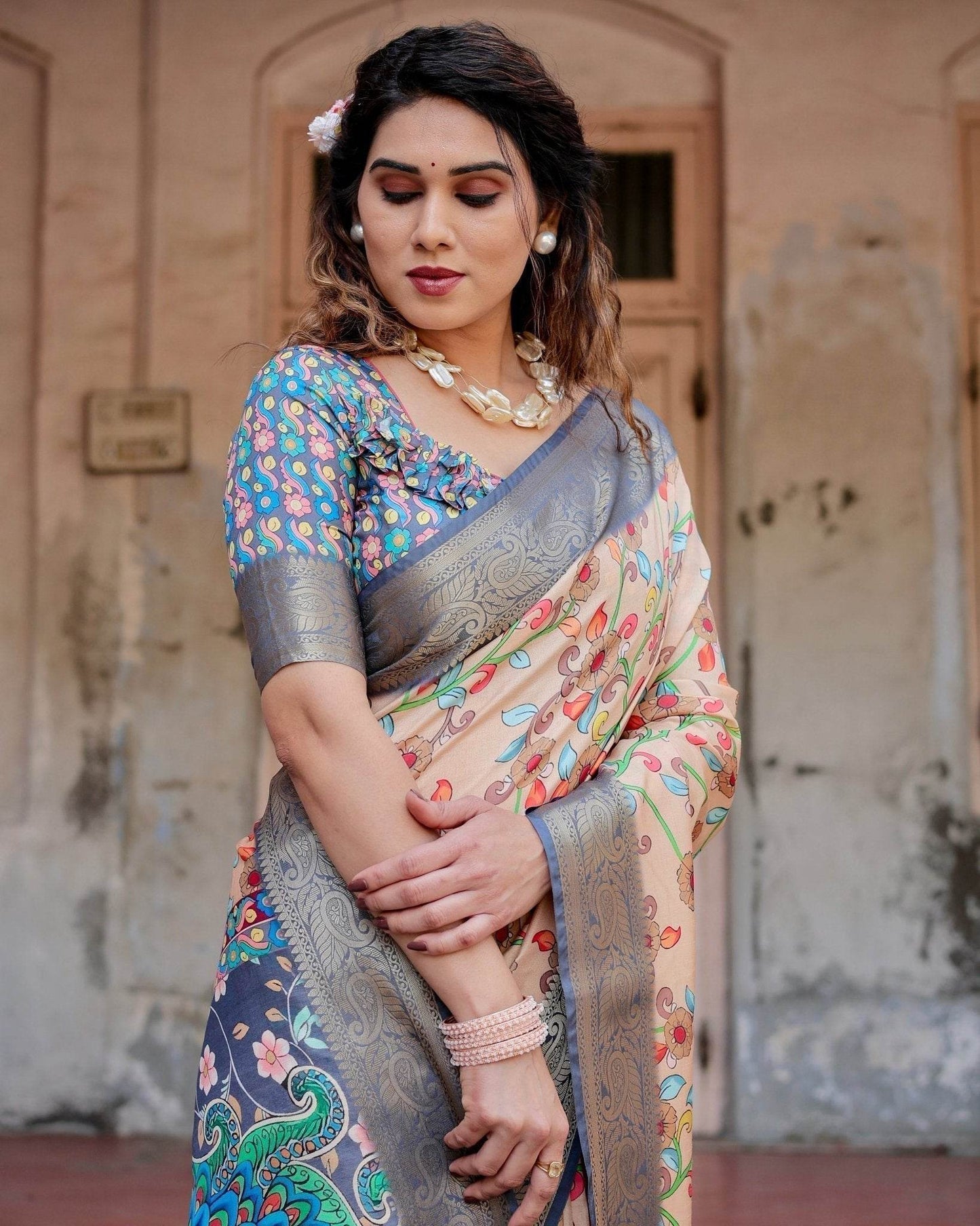 Peach and Navy Blue Floral Saree with Vibrant Peacock Pallu and Tassel Detailing - SEEANS