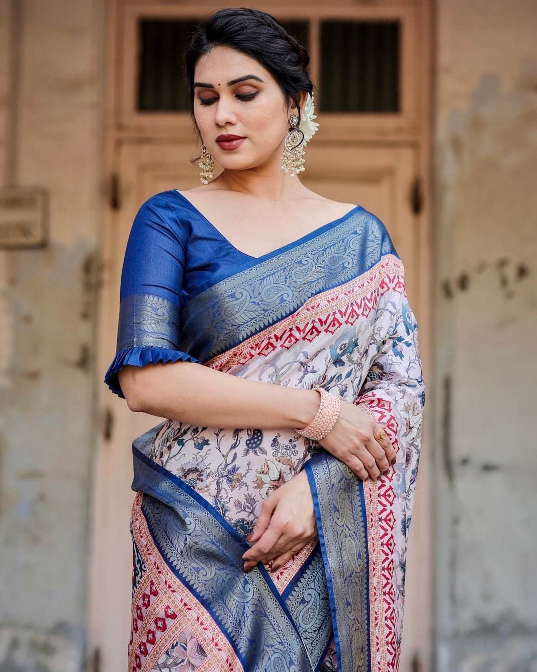 Ivory and Navy Blue Tussar Silk Saree with Floral Elegance and Ornamental Zari Work - SEEANS