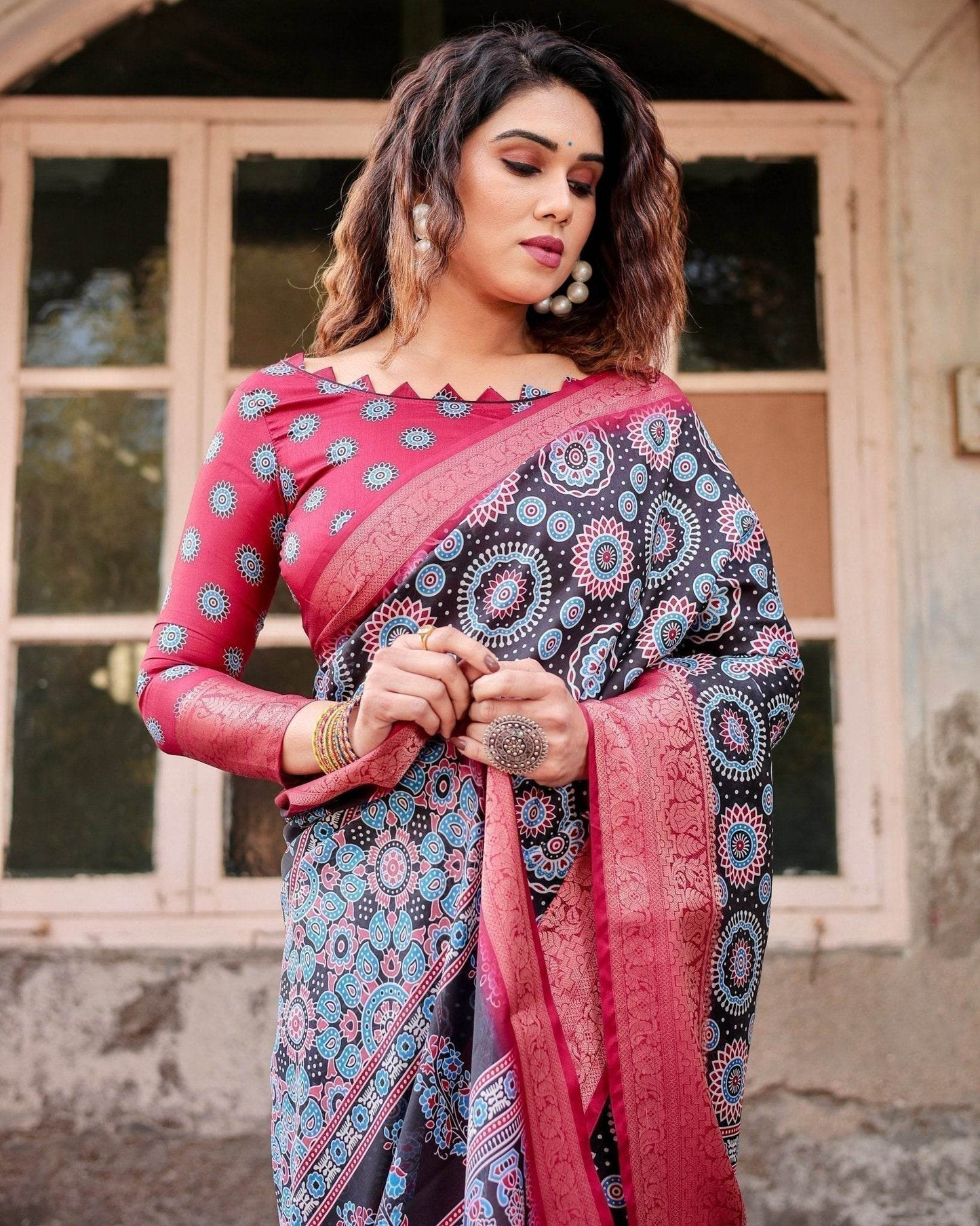 Black and Coral Tussar Silk Saree with Intricate Circular Motifs and Ornamental Pallu - SEEANS