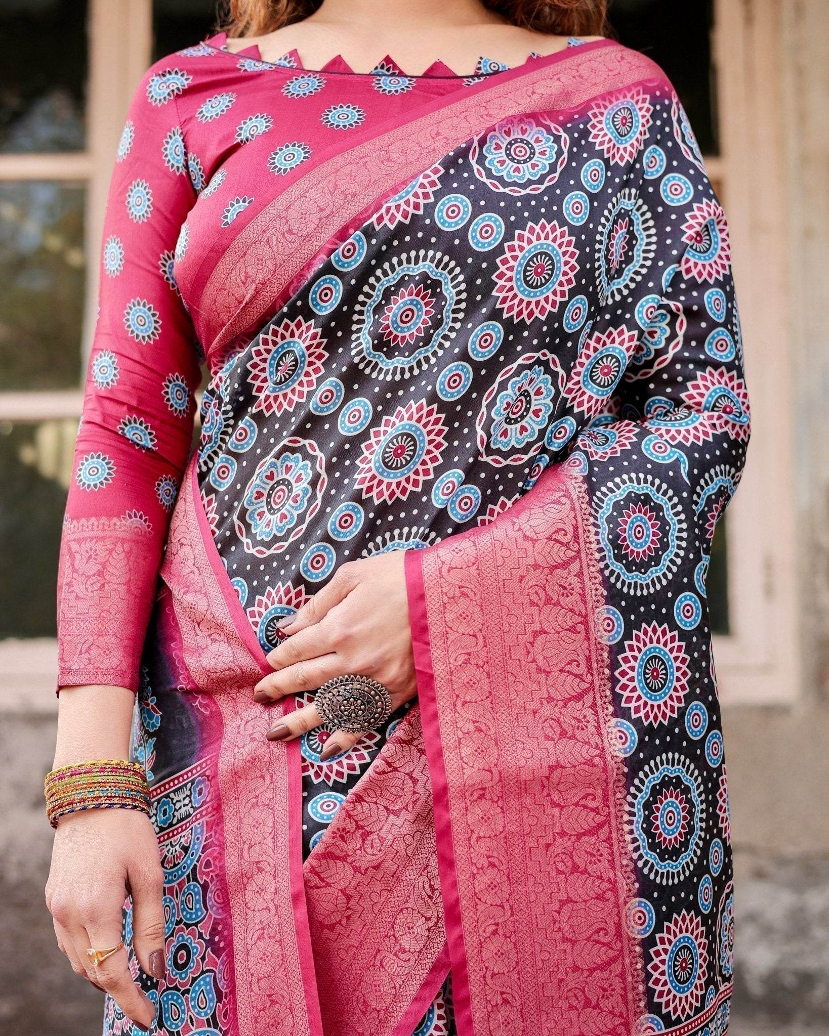 Black and Coral Tussar Silk Saree with Intricate Circular Motifs and Ornamental Pallu - SEEANS