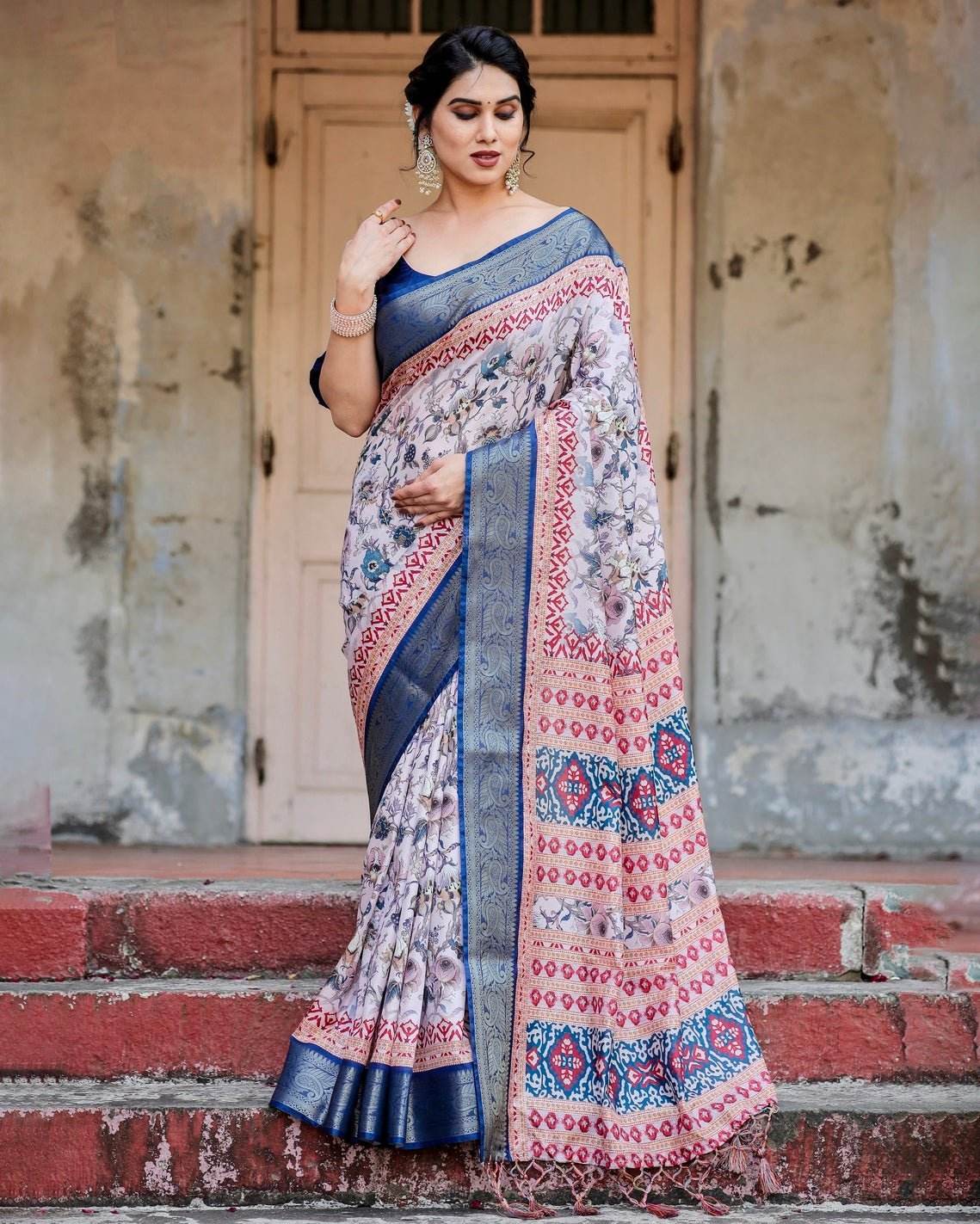 Ivory and Navy Blue Tussar Silk Saree with Floral Elegance and Ornamental Zari Work - SEEANS