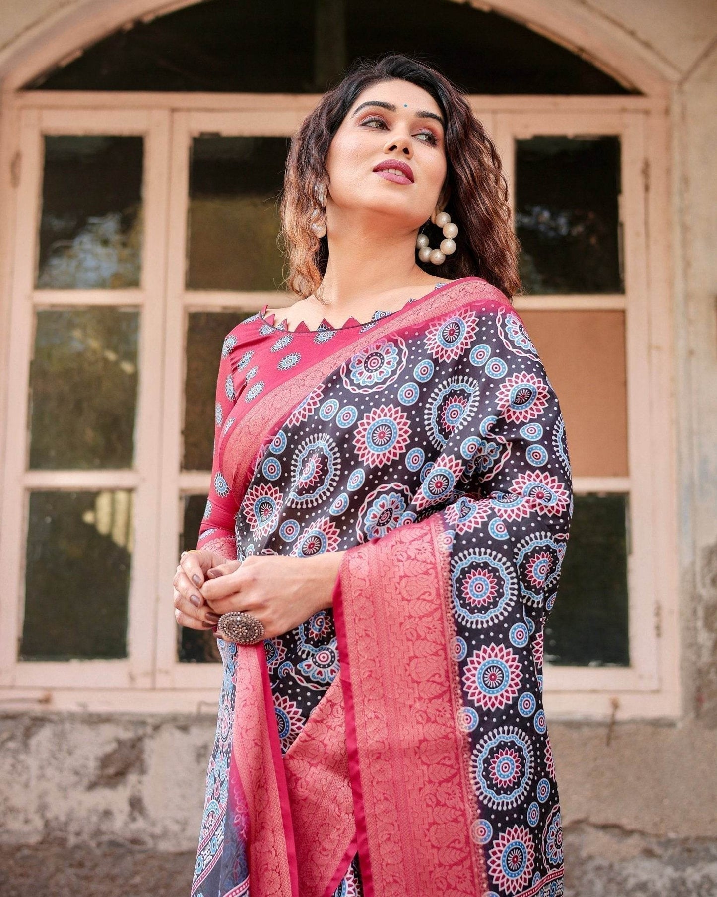 Black and Coral Tussar Silk Saree with Intricate Circular Motifs and Ornamental Pallu - SEEANS