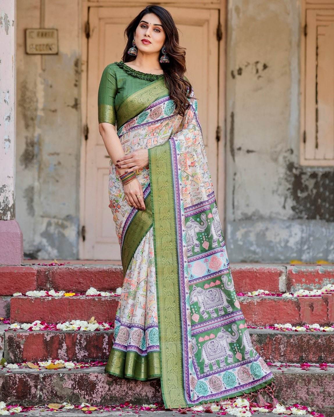 Ivory and Green Tussar Silk Saree with Elephant Motifs and Intricate Zari Border - SEEANS