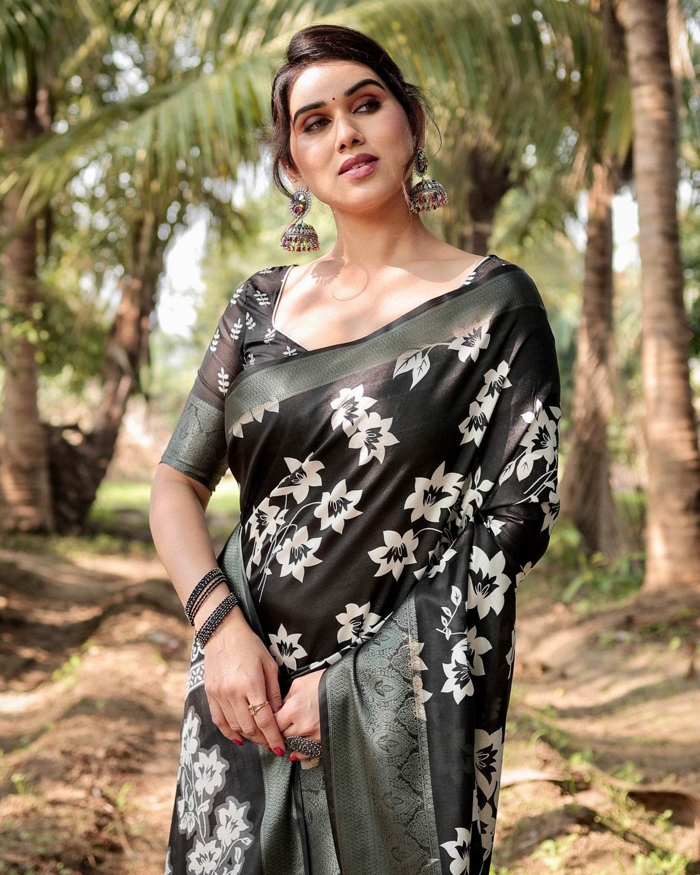 Elegant Black Tussar Silk Saree with Zari Embellished Border and Bold Floral Pallu - SEEANS