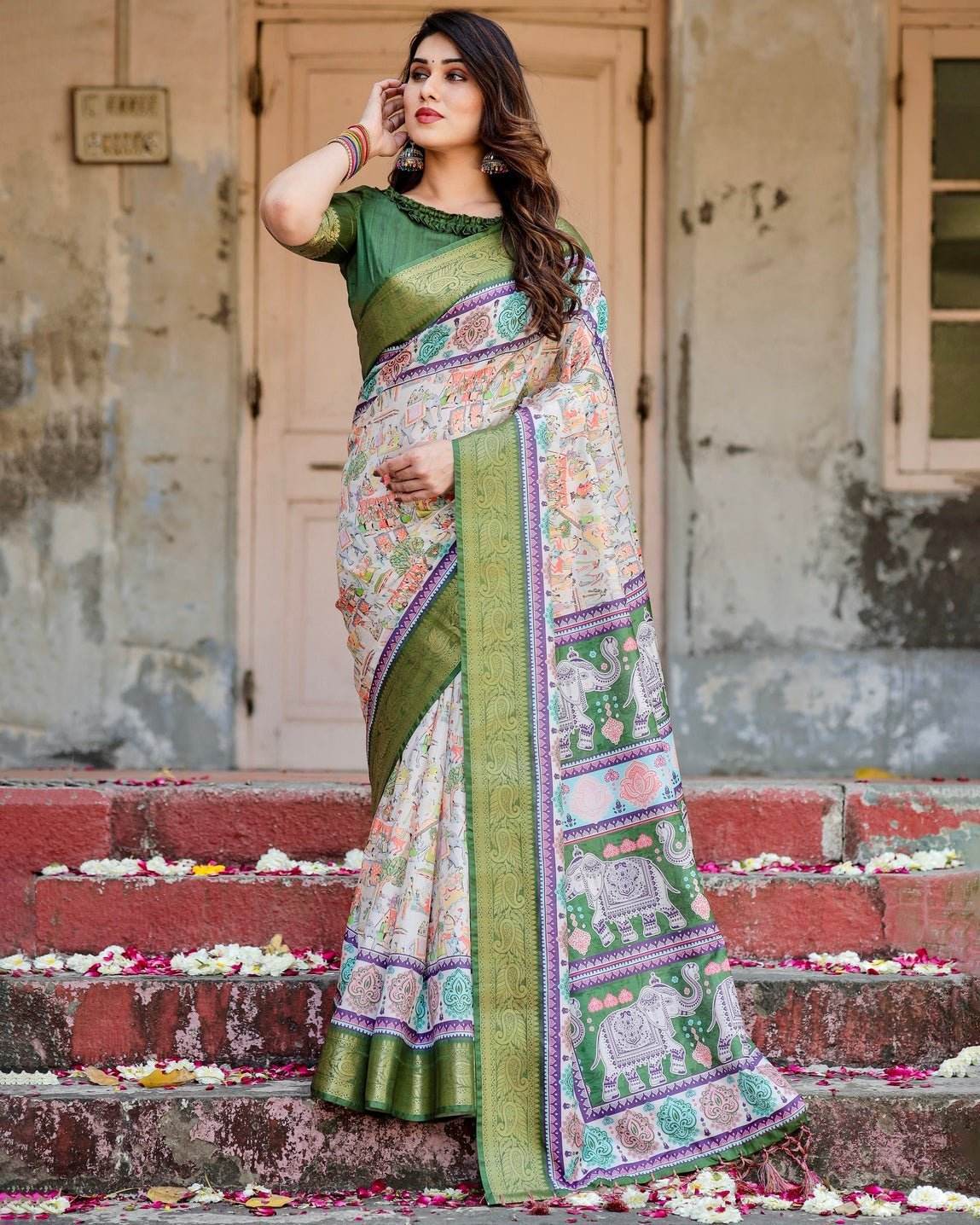 Ivory and Green Tussar Silk Saree with Elephant Motifs and Intricate Zari Border - SEEANS