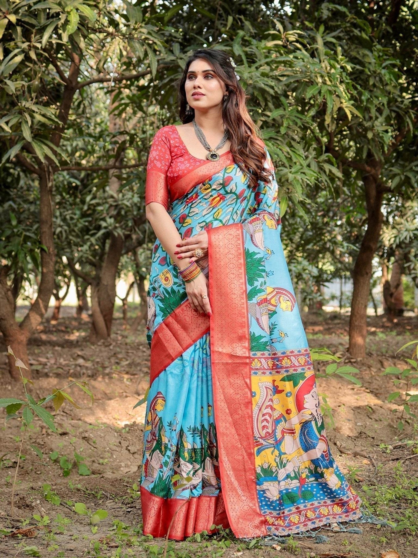 Aqua Blue Tussar Silk Saree with Vibrant Nature-Inspired Prints and Red Zari Border - SEEANS