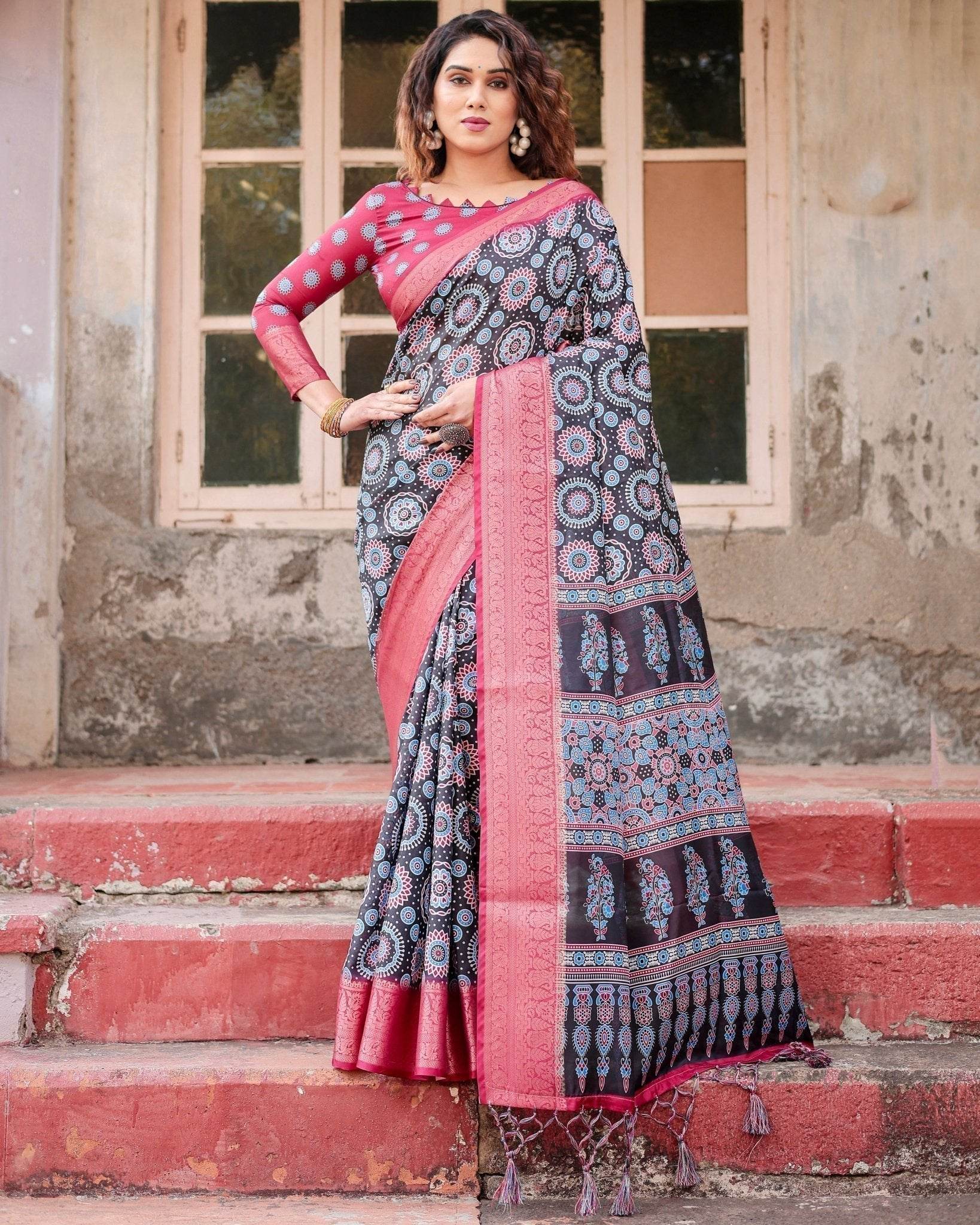 Black and Coral Tussar Silk Saree with Intricate Circular Motifs and Ornamental Pallu - SEEANS