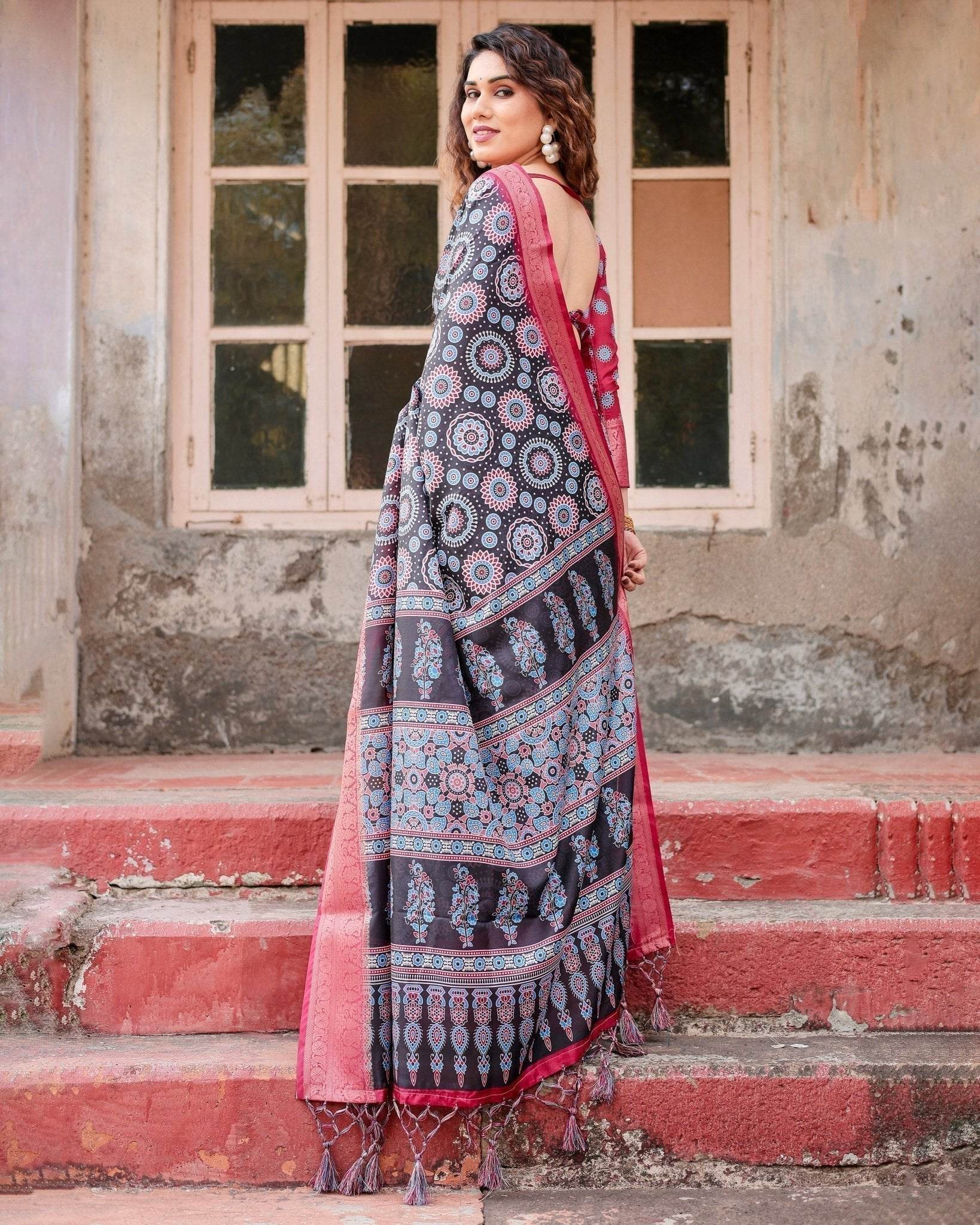 Black and Coral Tussar Silk Saree with Intricate Circular Motifs and Ornamental Pallu - SEEANS