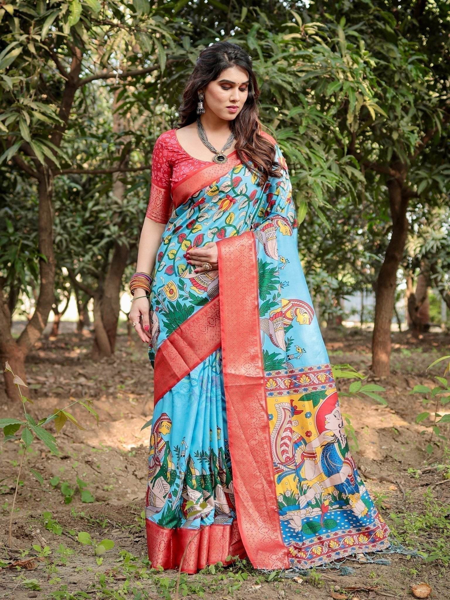 Aqua Blue Tussar Silk Saree with Vibrant Nature-Inspired Prints and Red Zari Border - SEEANS