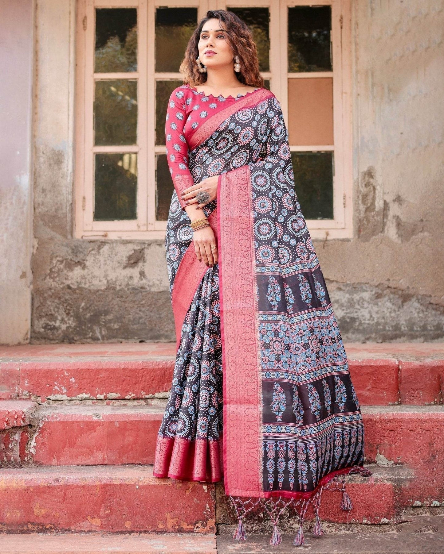 Black and Coral Tussar Silk Saree with Intricate Circular Motifs and Ornamental Pallu - SEEANS